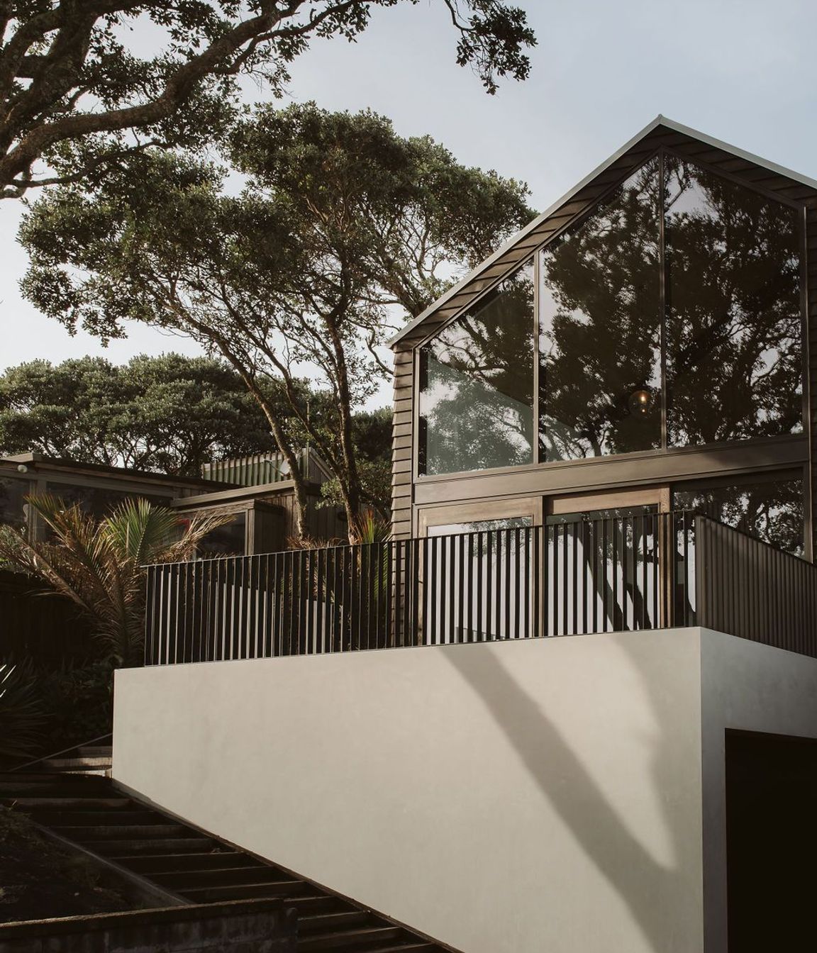 Constructed by Chris Bell Construction and designed by Glenn Brebner and Milca Severo of BOON Architects, this four-bedroom, three-bathroom home in Taranaki has been crafted with timelessness and environmental responsibility in mind.