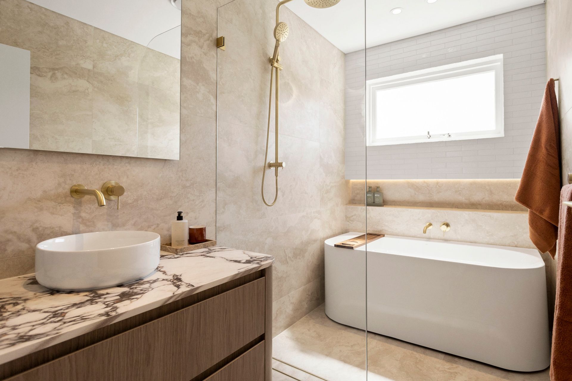 A stunning transformation, the bathroom's layout is now much more functional.