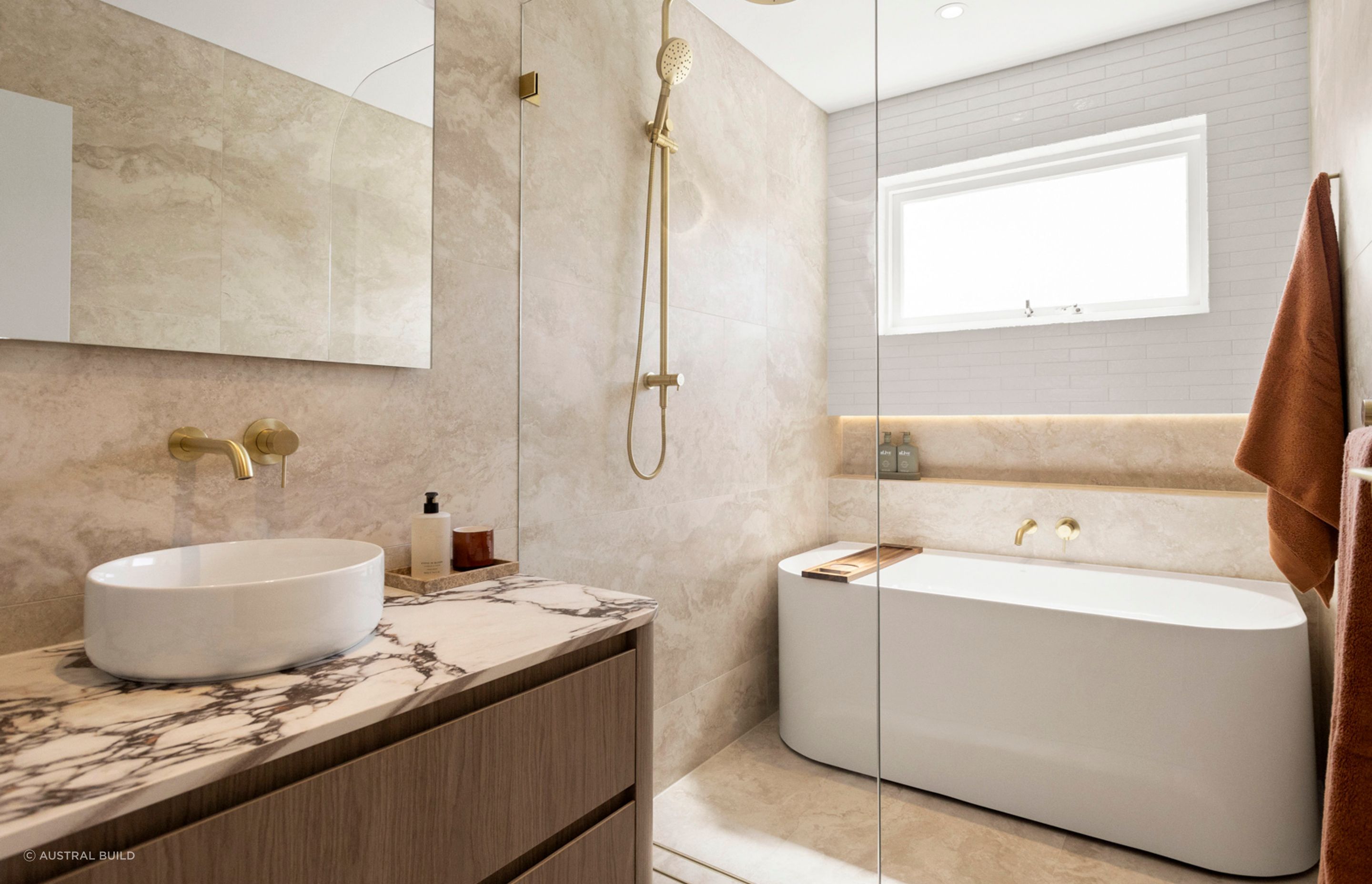 A stunning transformation, the bathroom's layout is now much more functional.