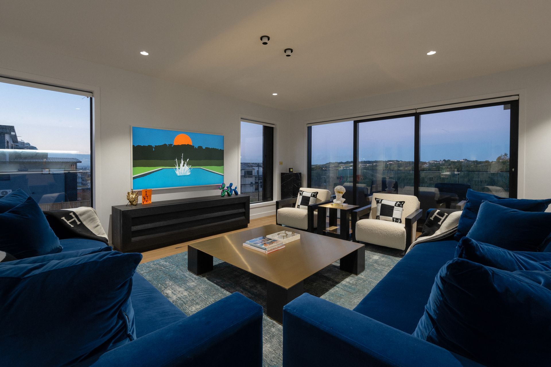 There are plenty of spaces to gather in the home, including the main lounge area.