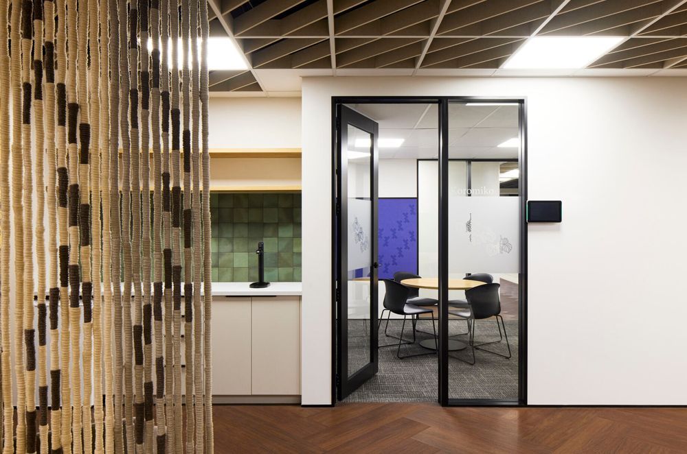 Most meeting rooms feature two doors to improve ease of access and safety, while circular tables promote equality and inclusivity.