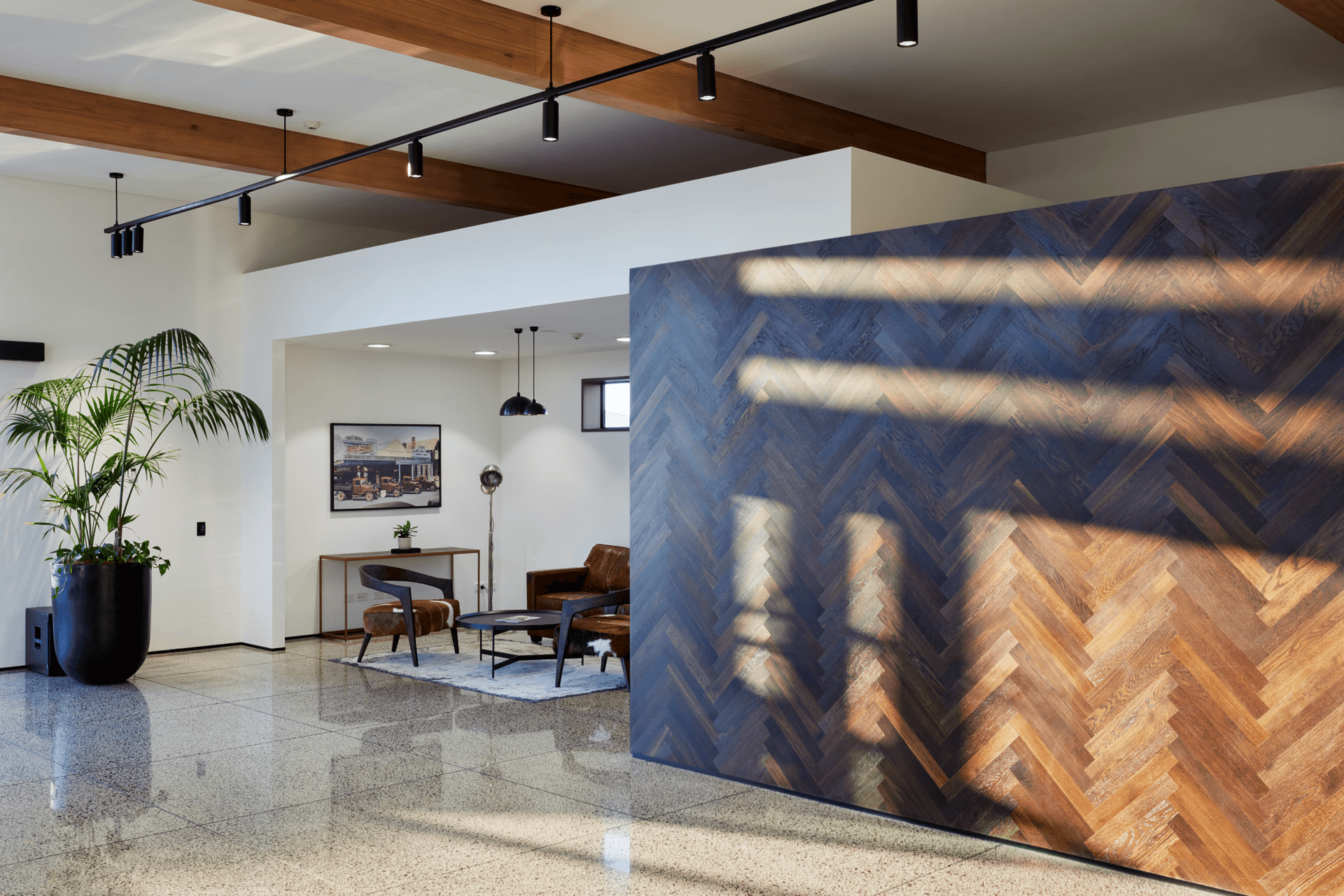 Rich timber elements and black light fittings complete the look.