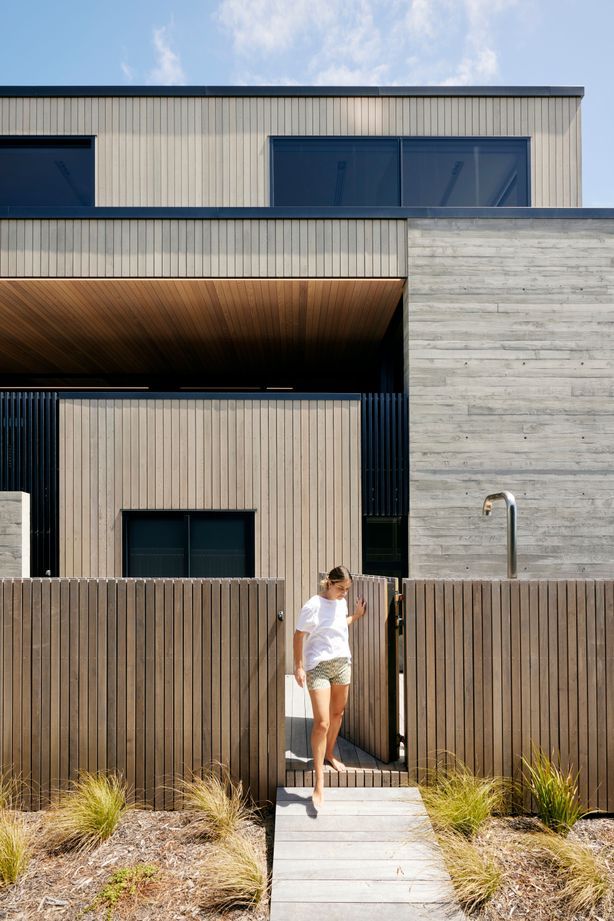 For all the architectural precision, it’s a fun and comfortable home for a young family. “It functions really well,” says Brendon. There are multiple decks, outdoor showers and a laundry window especially for throwing in wet togs and towels.