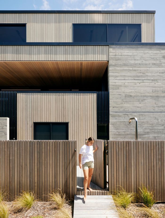 For all the architectural precision, it’s a fun and comfortable home for a young family. “It functions really well,” says Brendon. There are multiple decks, outdoor showers and a laundry window especially for throwing in wet togs and towels.