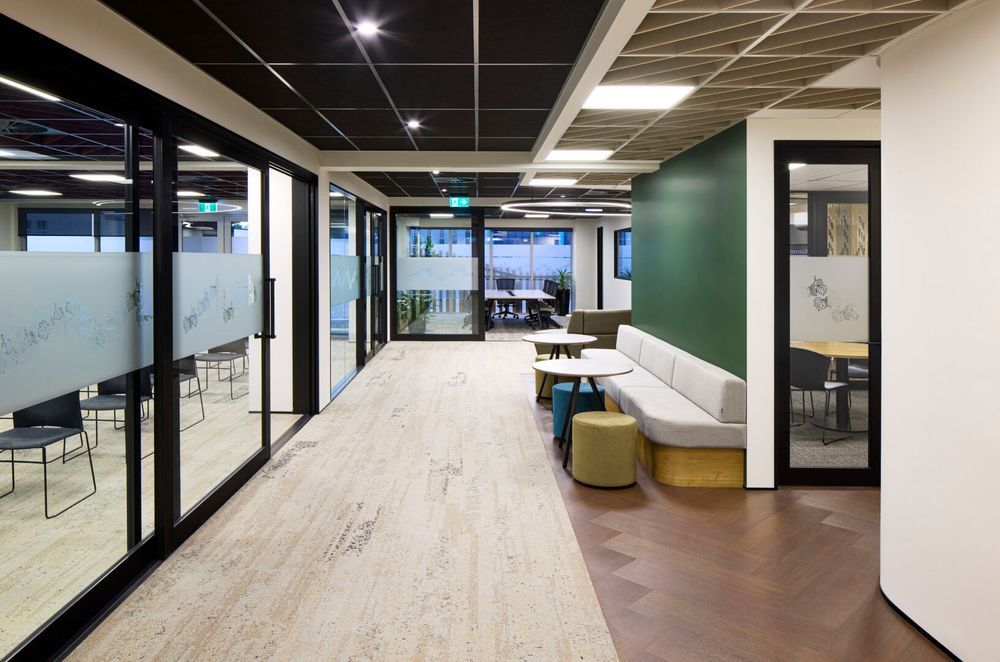 The material palette is warm and inviting to make visitors feel at ease.
