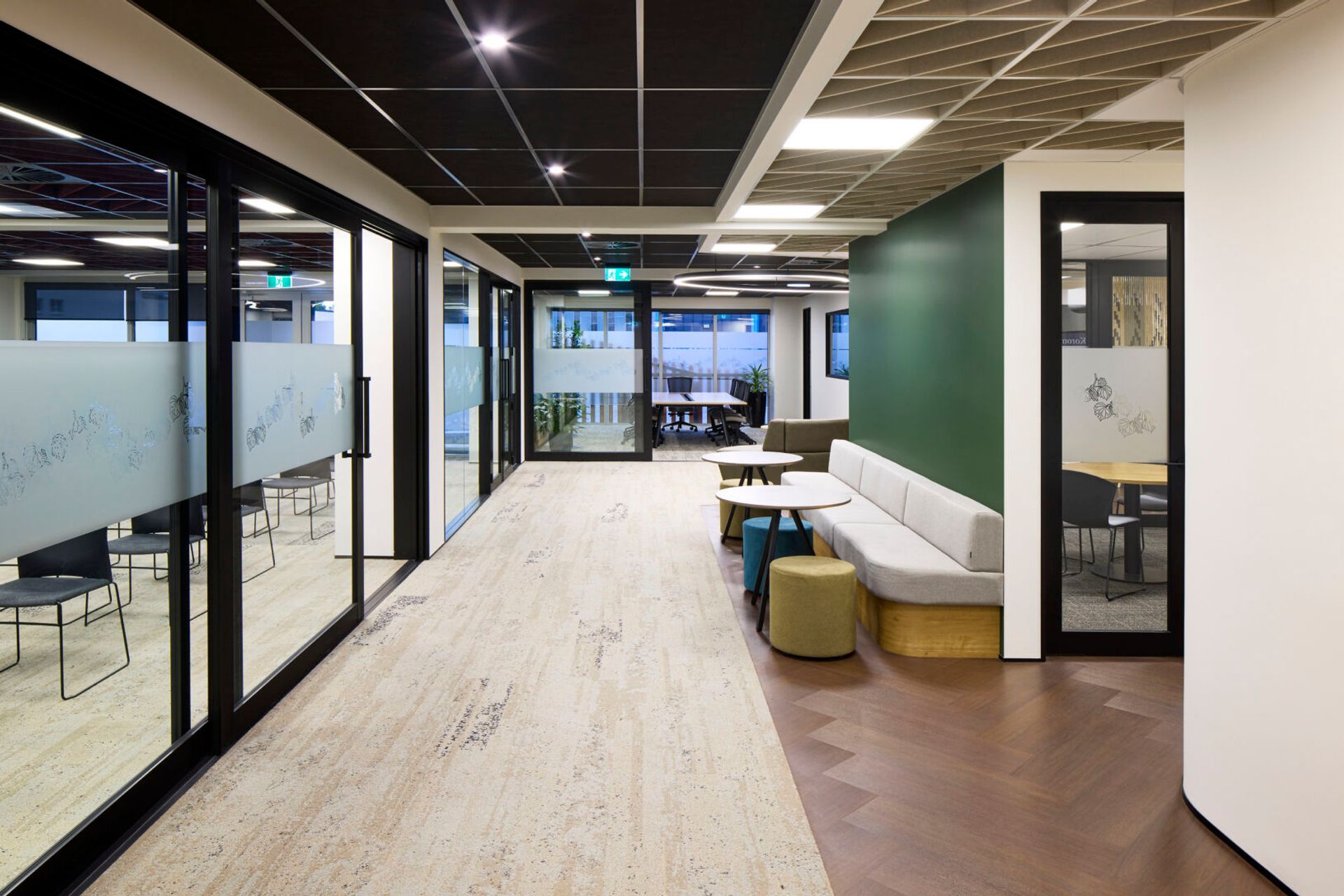 The material palette is warm and inviting to make visitors feel at ease.