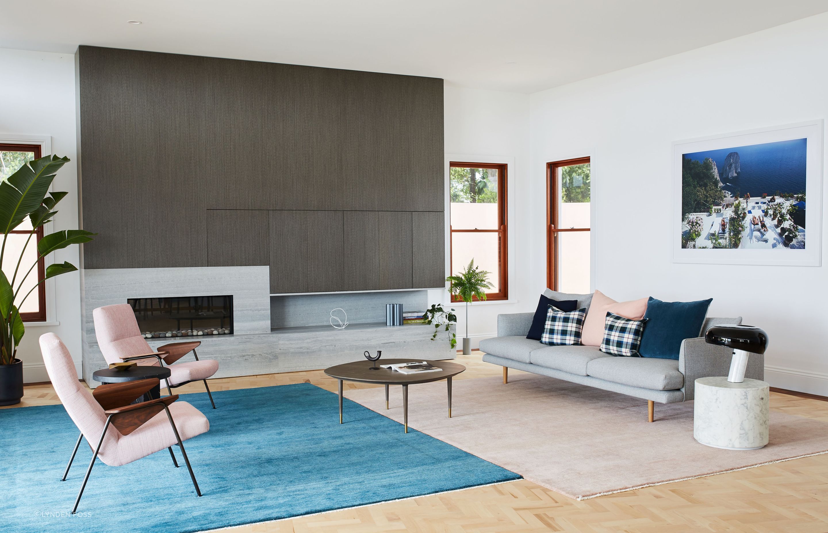 The fireplace is an important new addition to the cosy lounge space.