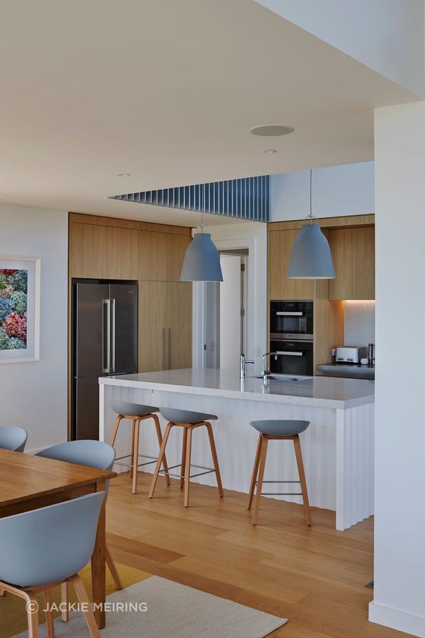 “There's quite a beautiful detail under the island bench where it has a folded origami base. We were really pleased with how they turned out. It has a little bit of crispness and a little bit of elegance to it but without being too full on,” says Kate.