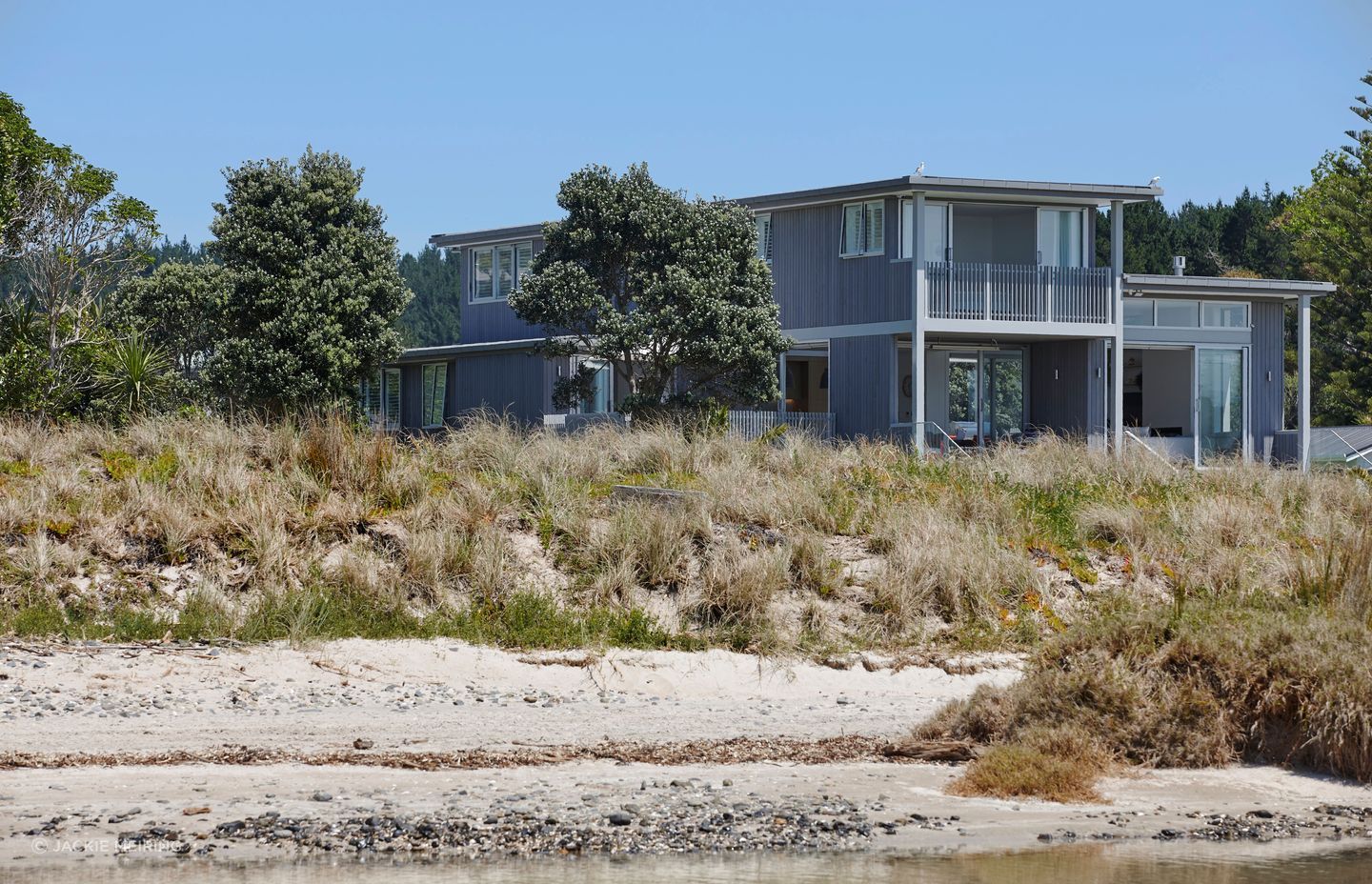 Kate says it’s important a house doesn’t look brand new and out of place. “We don't want a house to look like it's just arrived. In this case, it's kind of dipped in the sand, it's dipped in those grasses on the beach.”