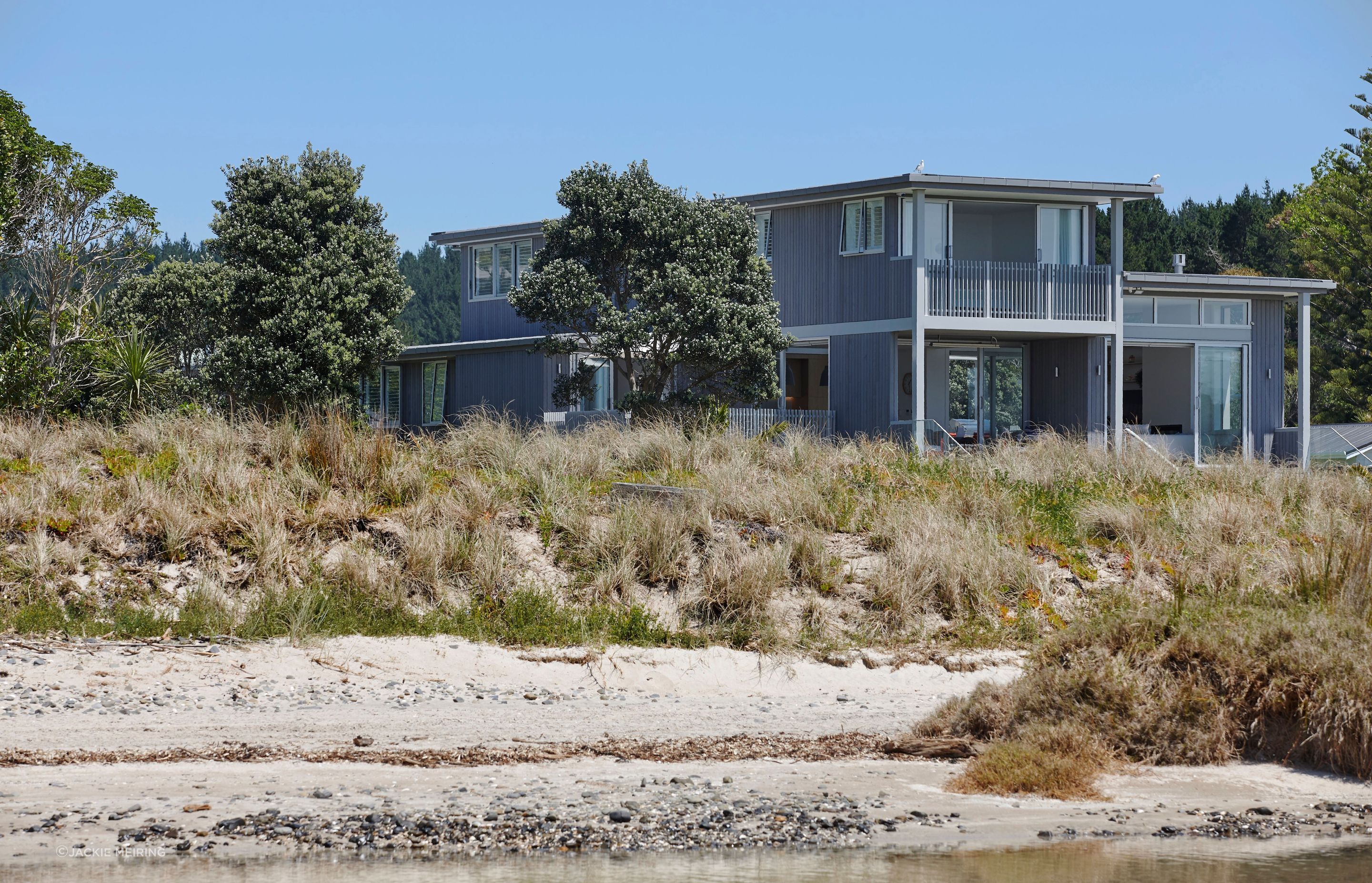 Kate says it’s important a house doesn’t look brand new and out of place. “We don't want a house to look like it's just arrived. In this case, it's kind of dipped in the sand, it's dipped in those grasses on the beach.”