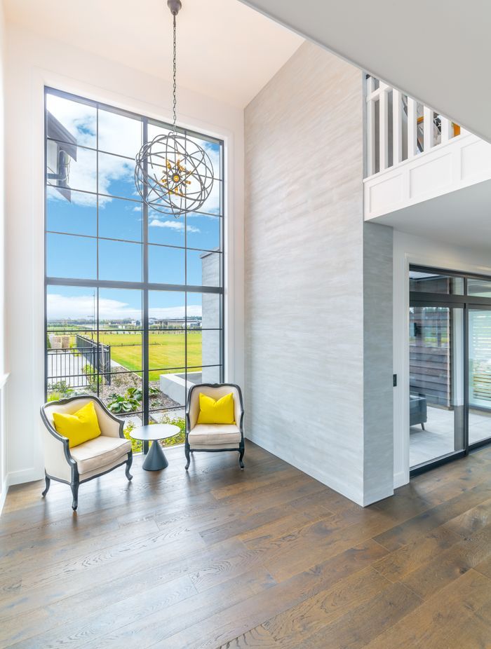 The single section of 5m high glazing in the entry foyer was carefully lifted into place by the team, and had to slot in neatly between the scaffolding  and the building.