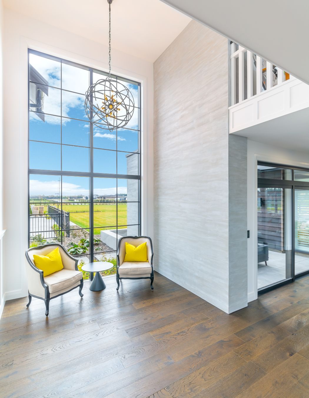 The single section of 5m high glazing in the entry foyer was carefully lifted into place by the team, and had to slot in neatly between the scaffolding  and the building.