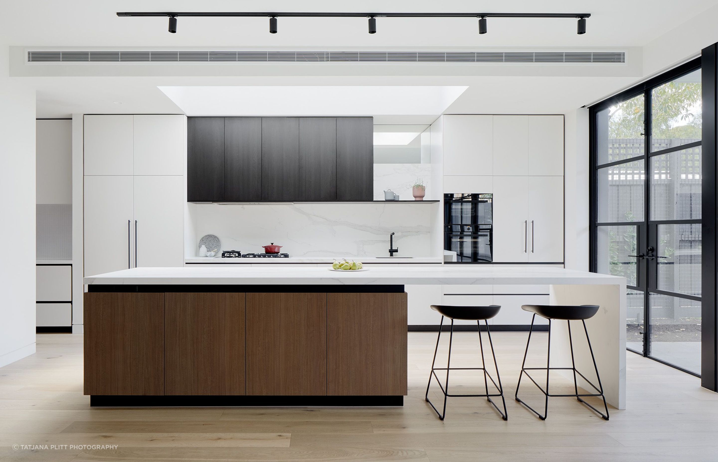 "The kitchen was really important; it was probably the most important room in the house for the client. They wanted it to be generous, light-filled, have lots of storage, and be a robust, working kitchen because they love to cook."