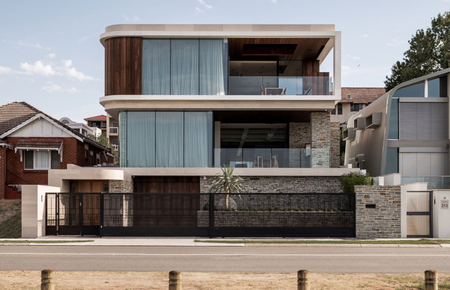 The Art Deco curves of the street-facing elevation reflect the Art Deco inspiration behind the design.