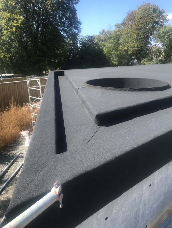 The roof has a lot of unique detailing, installed by a team of skilled roofers and waterproofers from Canterbury Waterproofing.