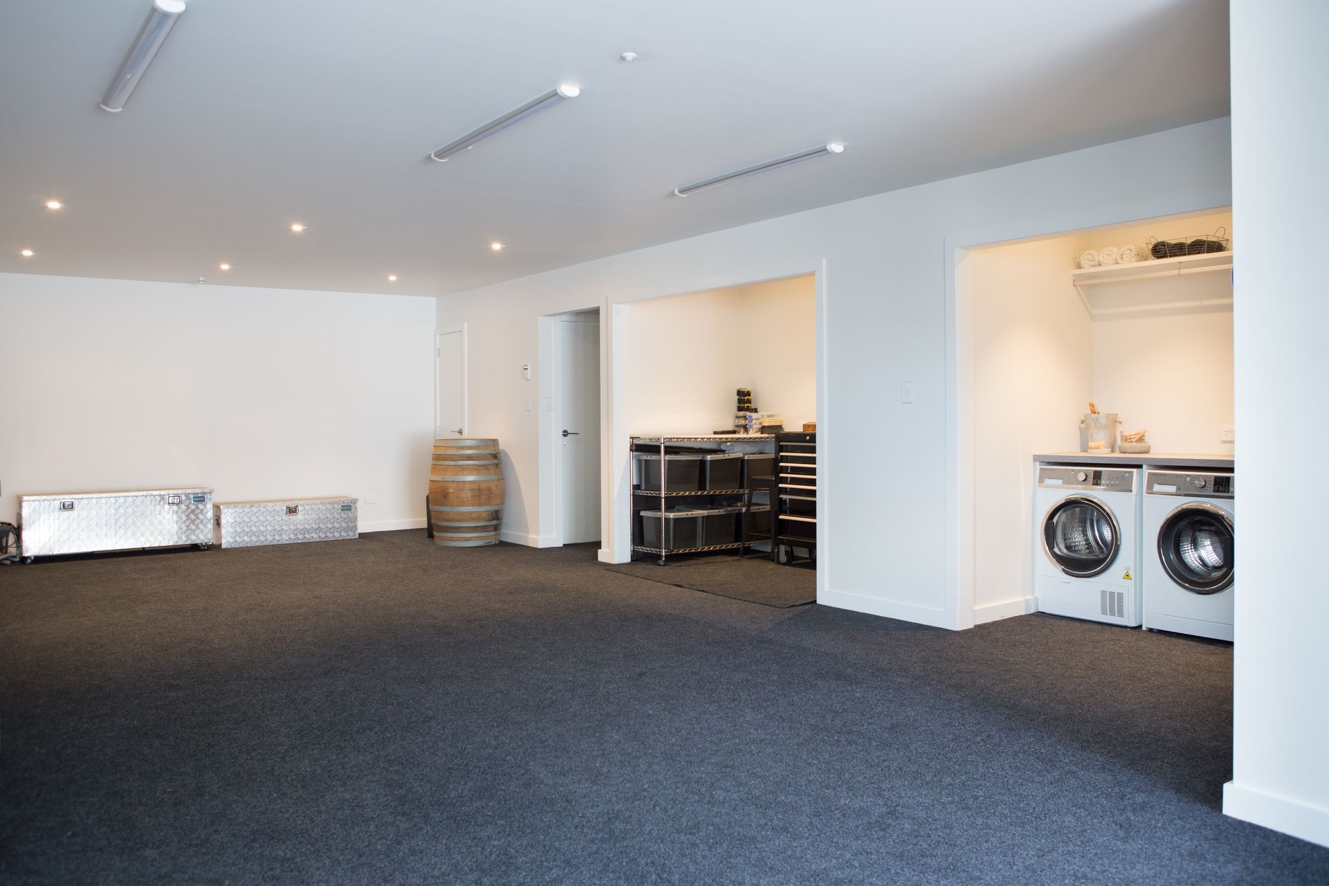 A large basement was added to cater for two to three cars. A laundry, workshop and small wine cellar are also found on this level, along with a lift to travel up to the main floor.