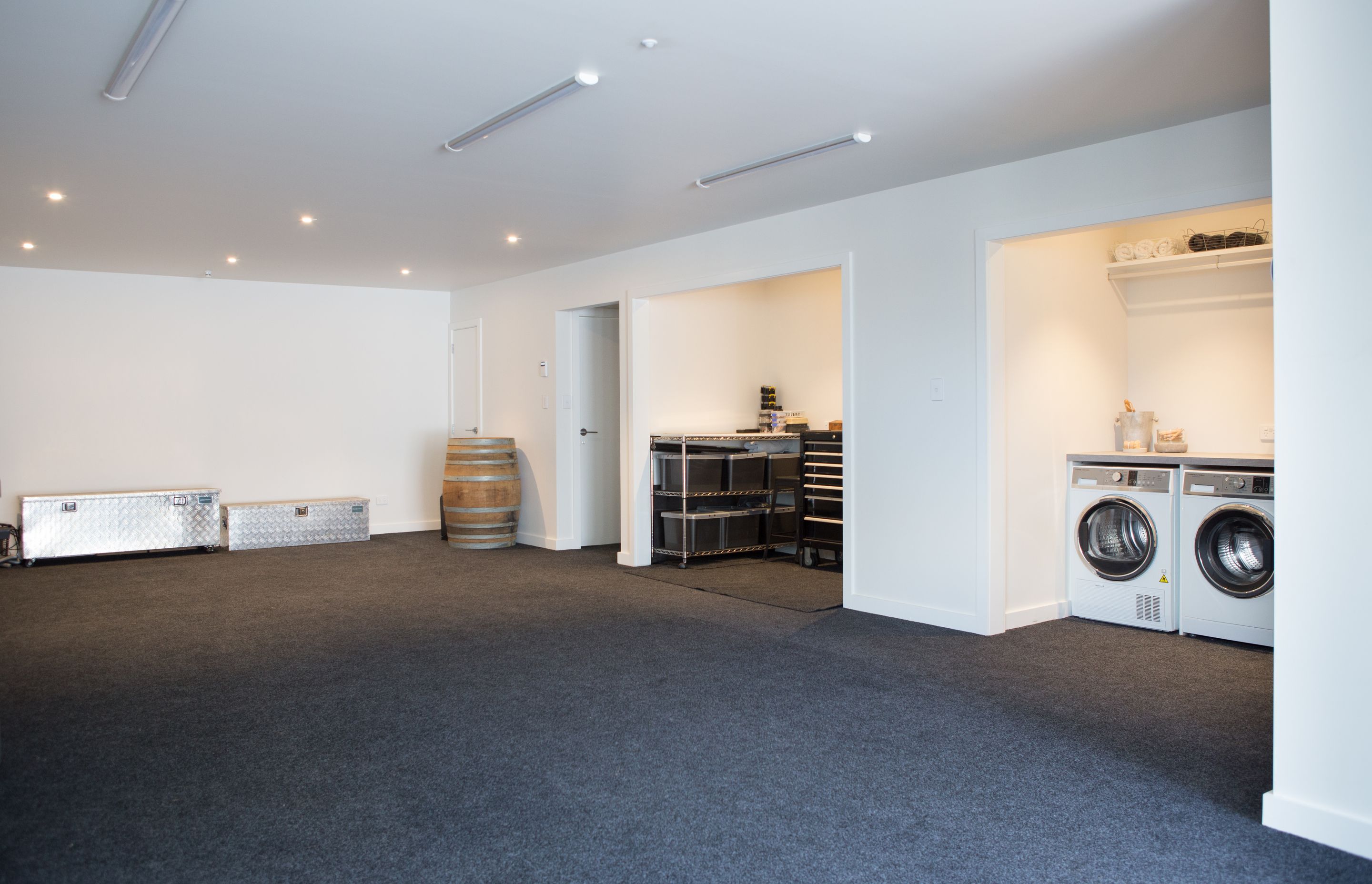 A large basement was added to cater for two to three cars. A laundry, workshop and small wine cellar are also found on this level, along with a lift to travel up to the main floor.