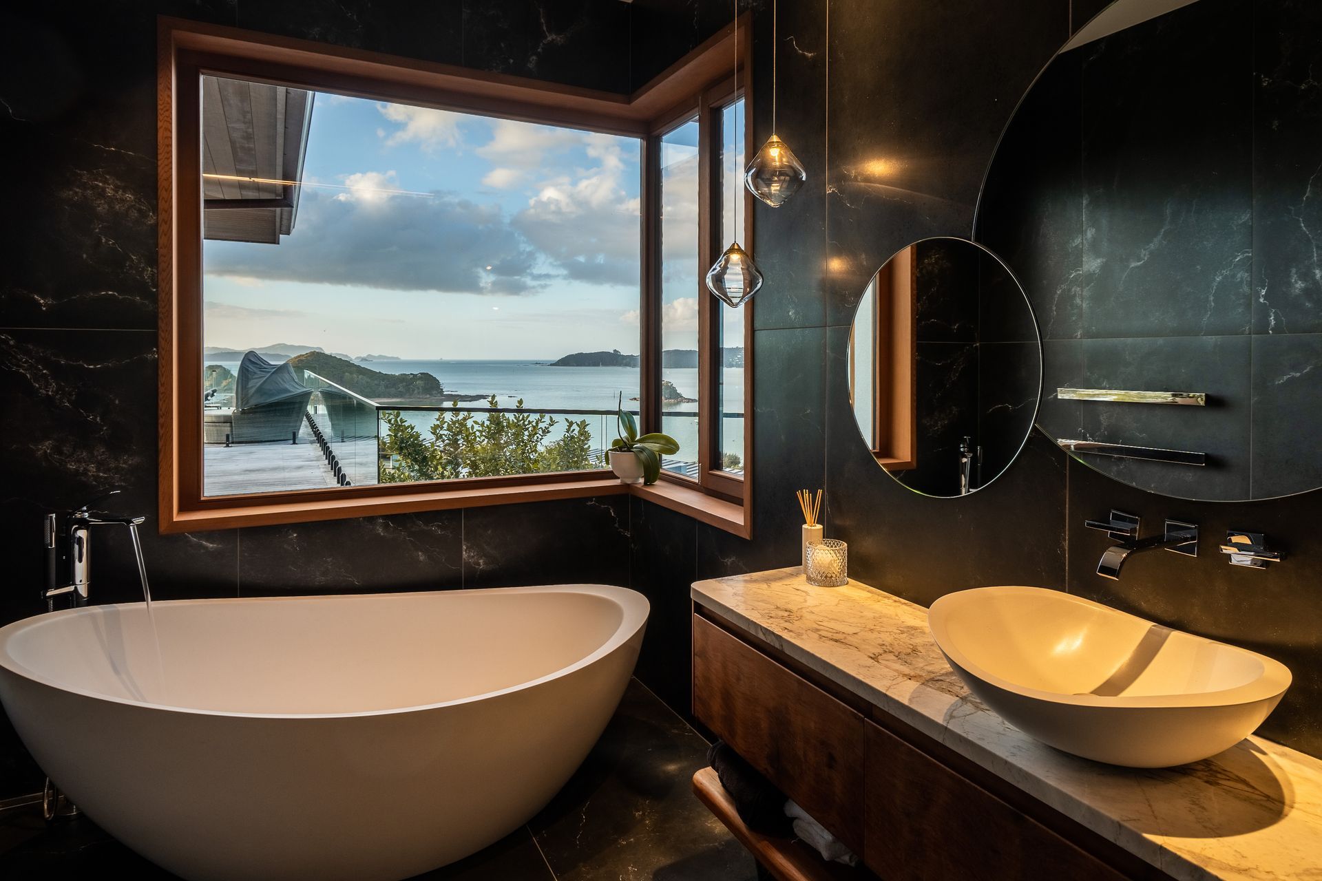 A bathroom with a view. The bath tapware is by Kohler.