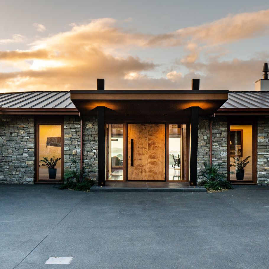 Refined industrial chic immersed in a Bay of Islands vista