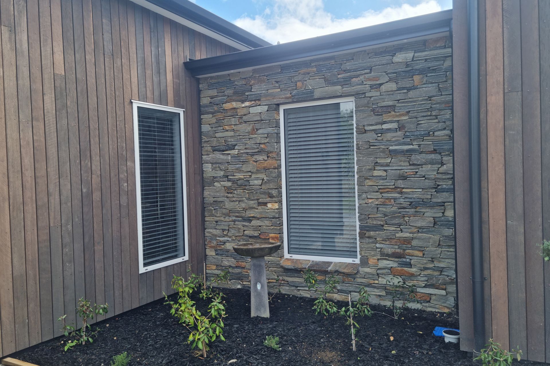 Thanks to the benefits of natural schist, the owners won’t need to do much to keep the stone walls looking as beautiful as the day they were built.