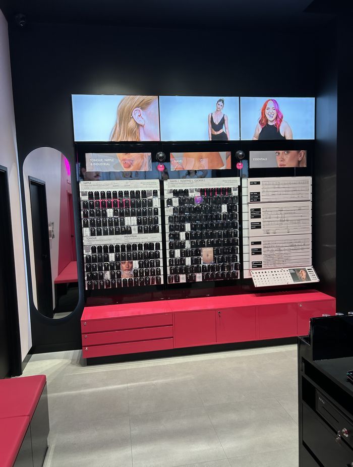 The store's glossy interior features built-in display and storage cabinetry.