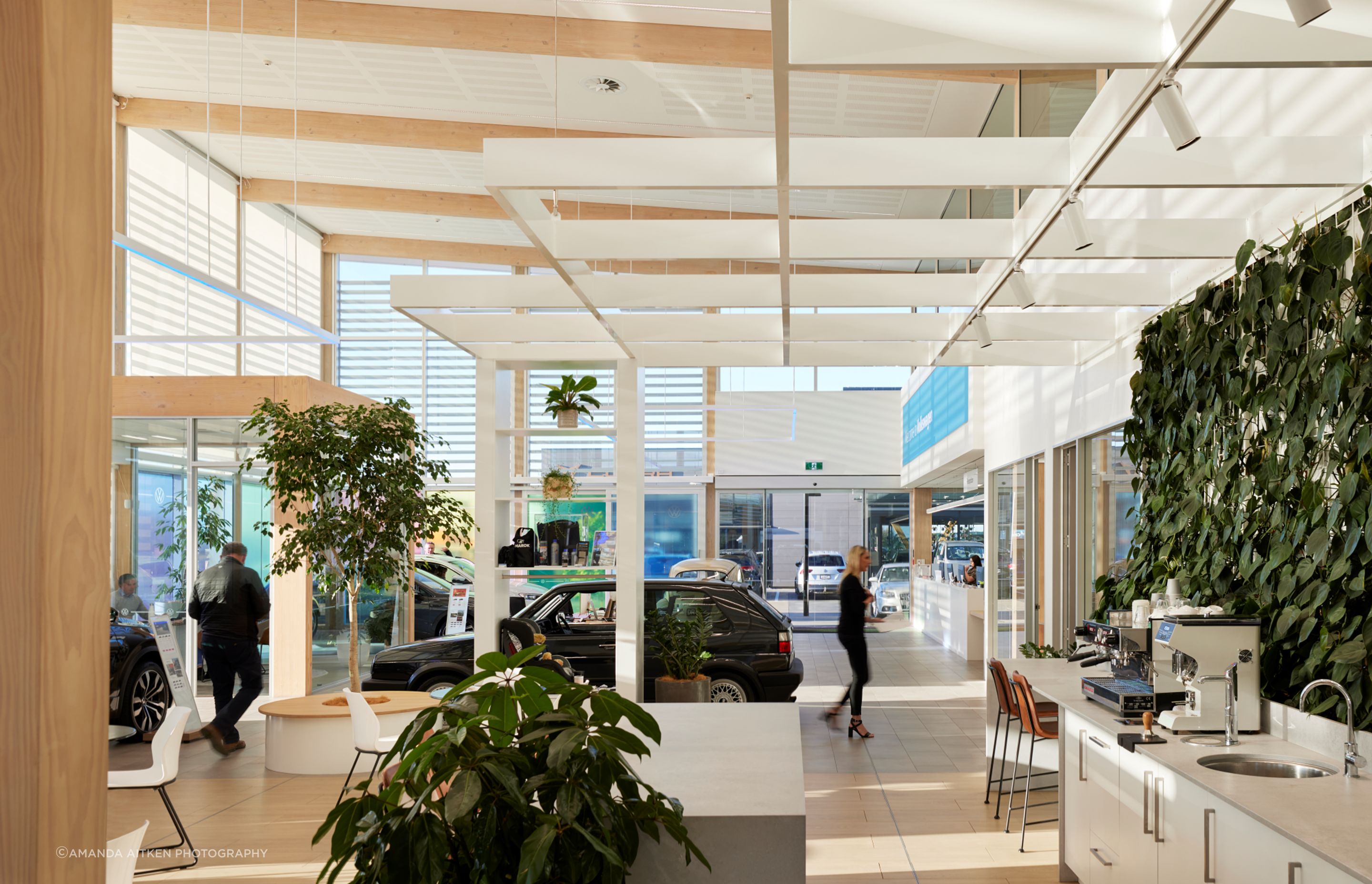On the interior, the pale and serene material palette is carried through.