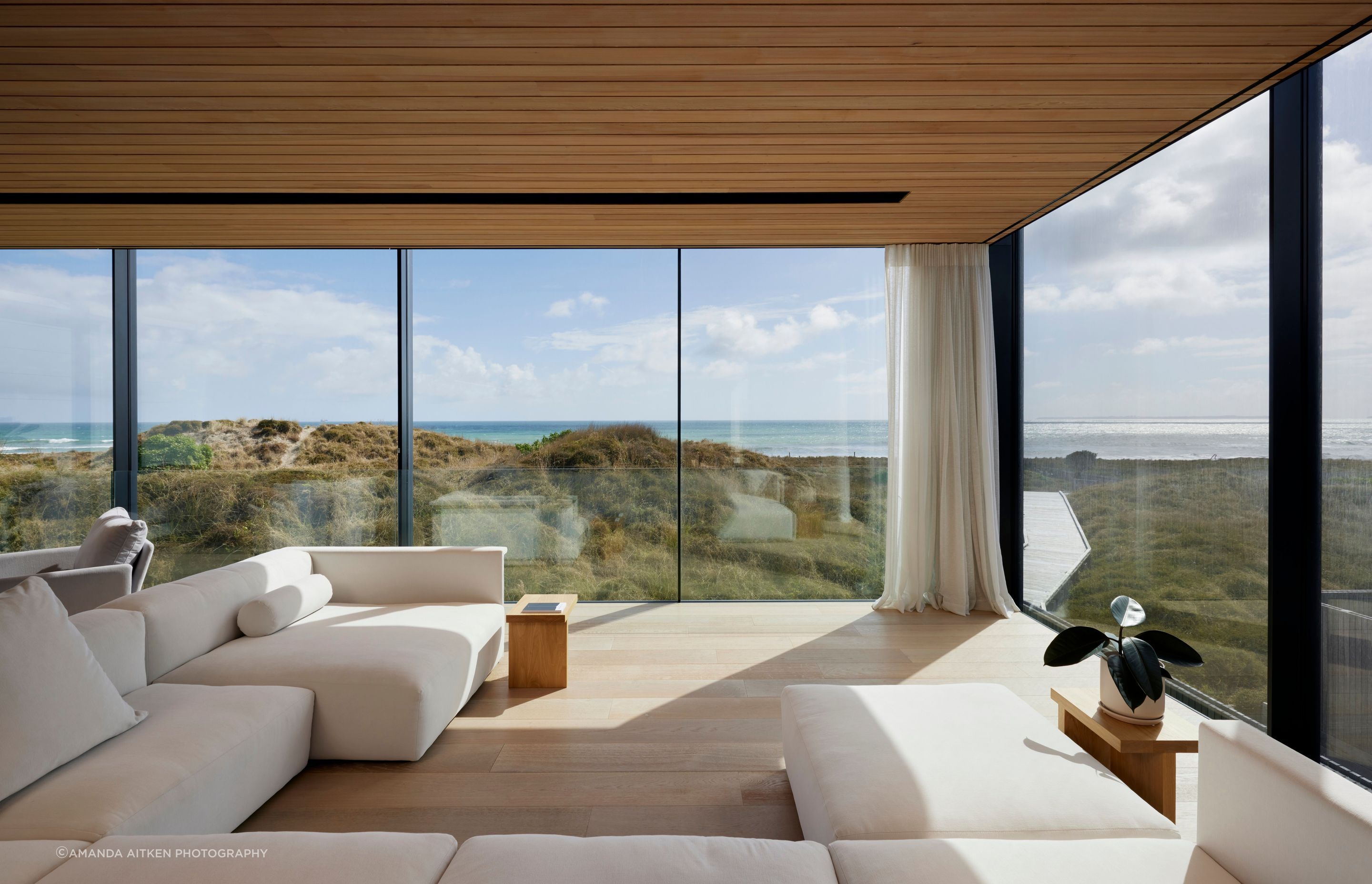 Brendon didn’t want a deck structure obstructing the view from inside so the glazing slides away and the cantilevered lounge area effectively becomes the outdoor living space.