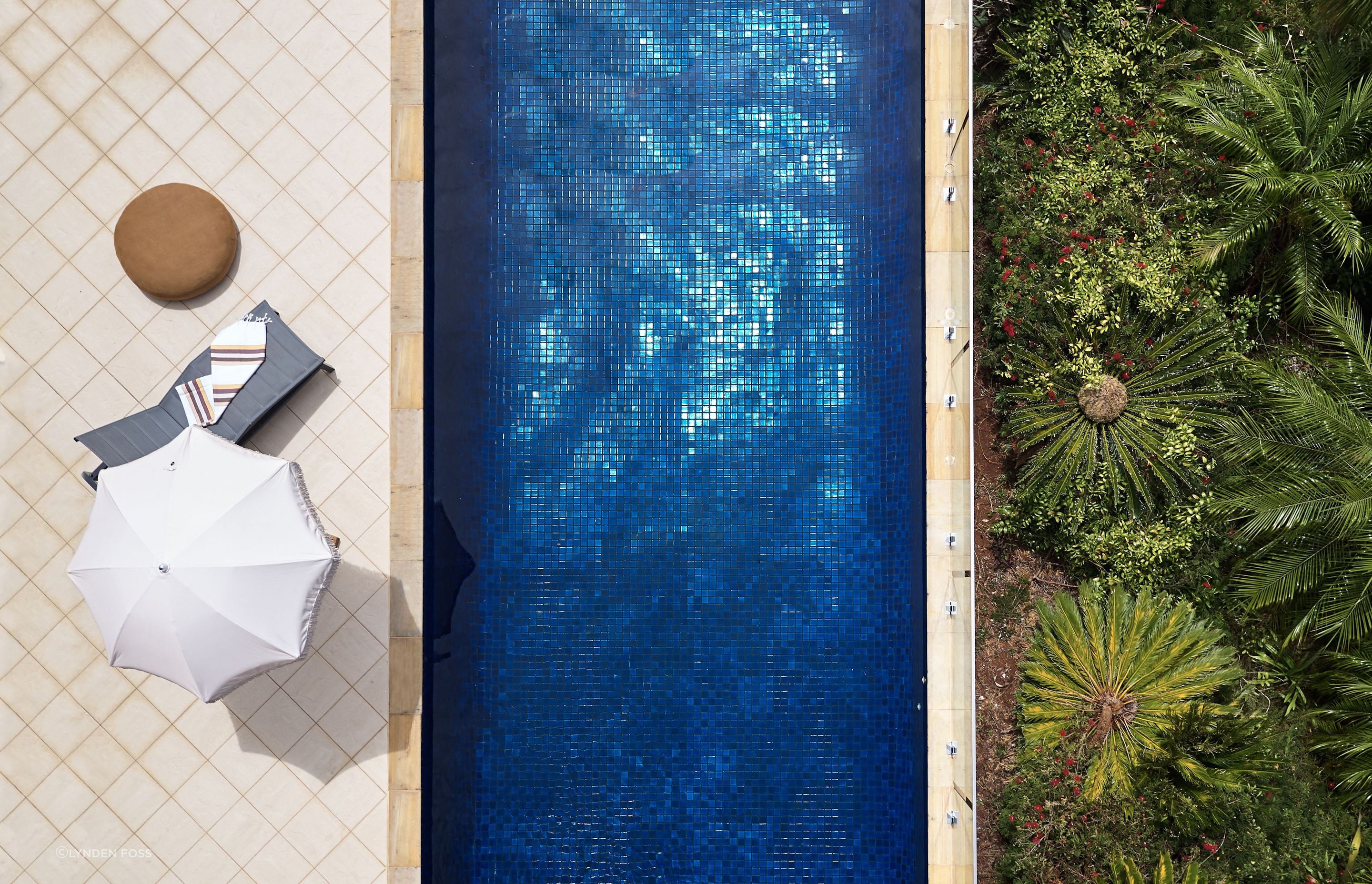 The pool area was rejuvenated with new tiles and now looks like a resort.