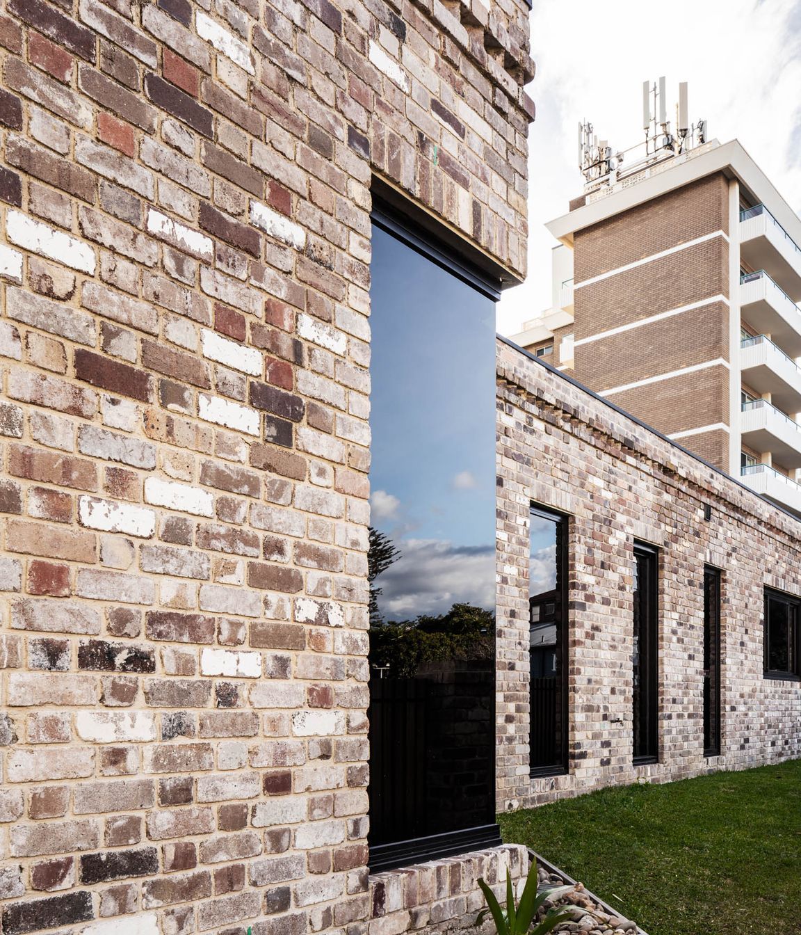The recycled brickwork blends in with its neighbours.