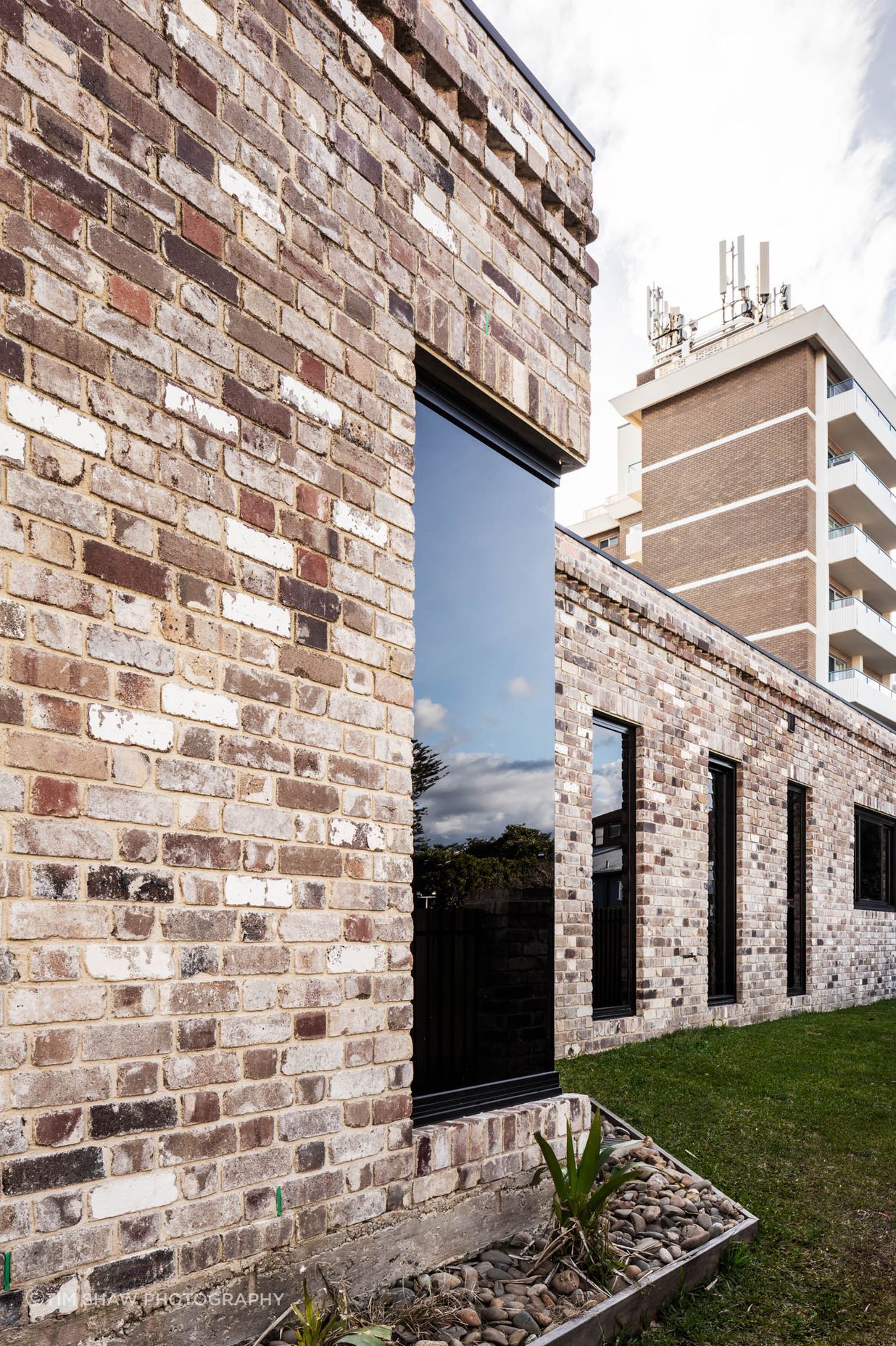 The recycled brickwork blends in with its neighbours.
