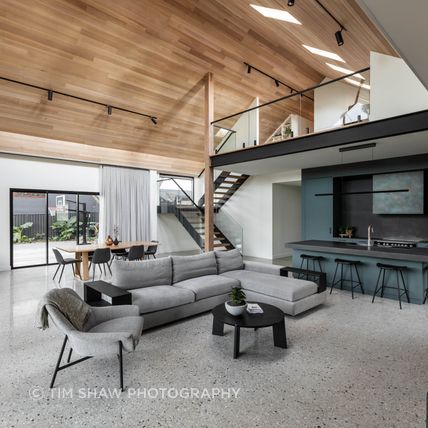 The ceiling draws the eye up towards the mezzanine.