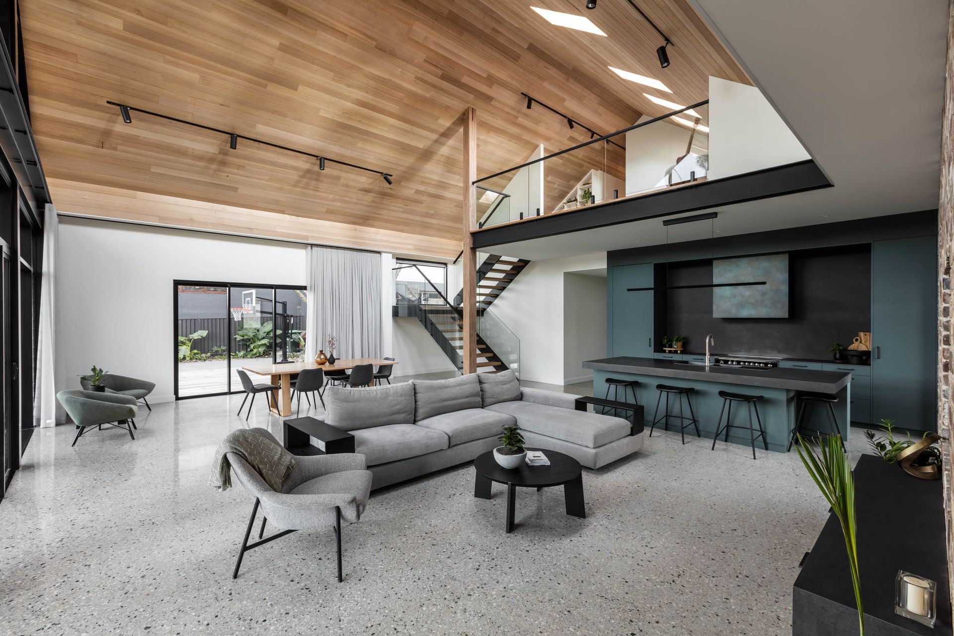 The ceiling draws the eye up towards the mezzanine.