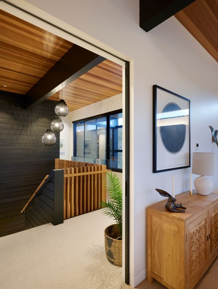 Brendon says the house has an extra-tall stud height. “And those nice big grunty beams running through.”