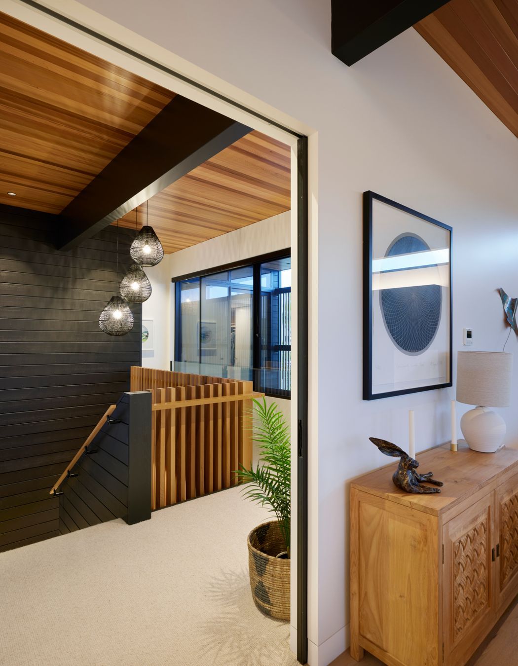 Brendon says the house has an extra-tall stud height. “And those nice big grunty beams running through.”