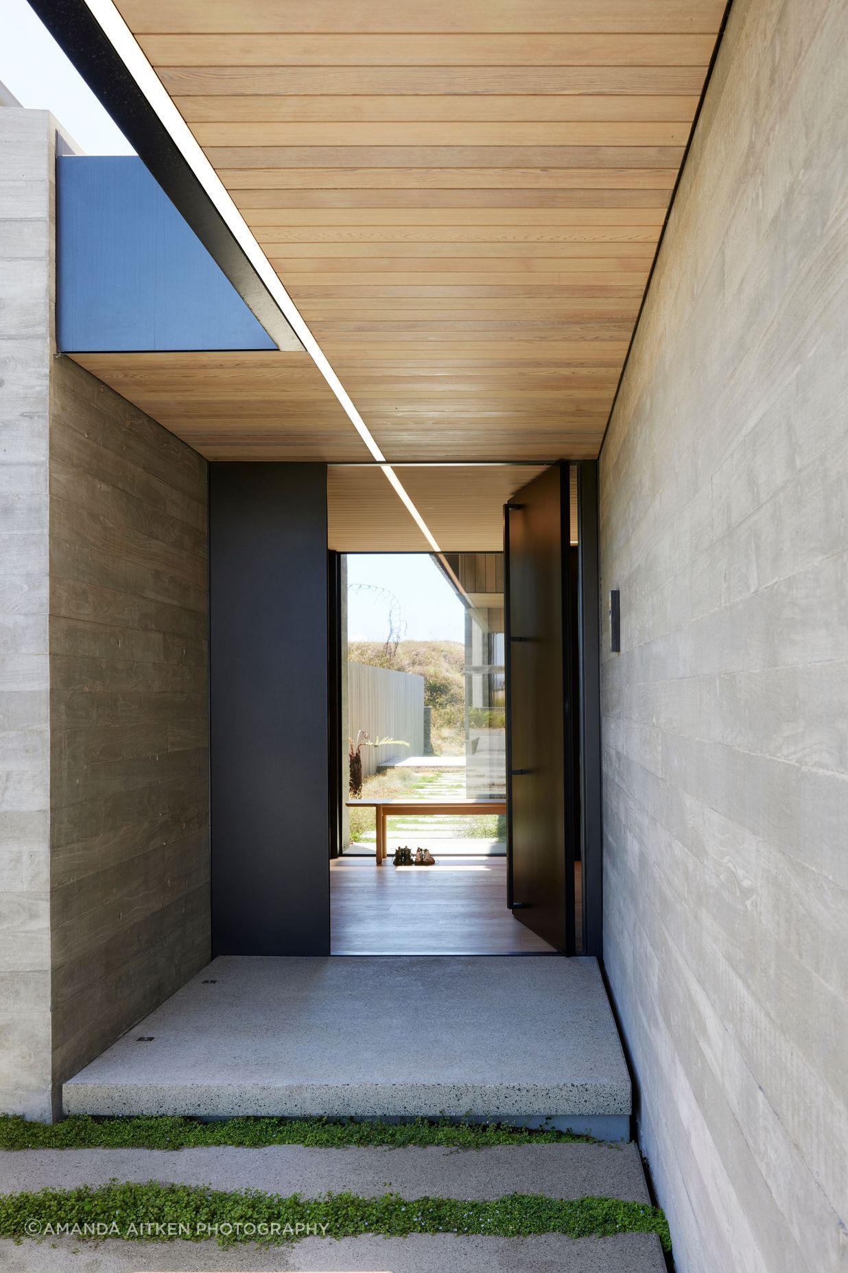 The entrance from the street side utilises the concept of solid and void, and the lighting leads the eye through. “We decided to have a sense of arrival so that’s why it’s a full-height pivoted door,” says Brendon.
