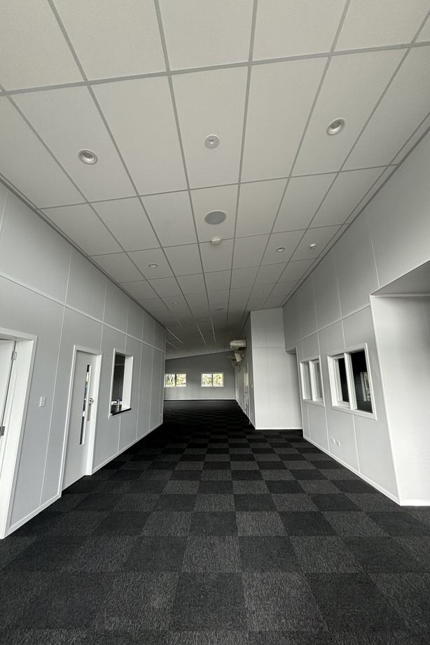 “To achieve the required fire ratings, Climateline was applied as a decorative overlay on approved fire-rated wall systems. This innovative approach eliminated the need for stopping or painting, as Climateline seamlessly covers board joins—even on fire-rated walls—streamlining installation while ensuring compliance and aesthetic appeal.”