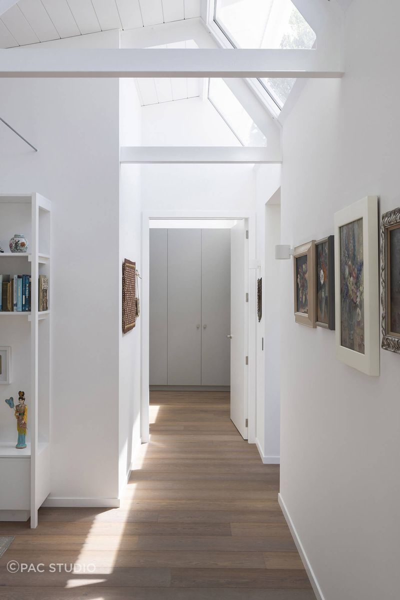 The home’s plan follows a rational grid, but the intricacy lies in the section with raking windows, roof edges, and the carefully integrated structural frame.