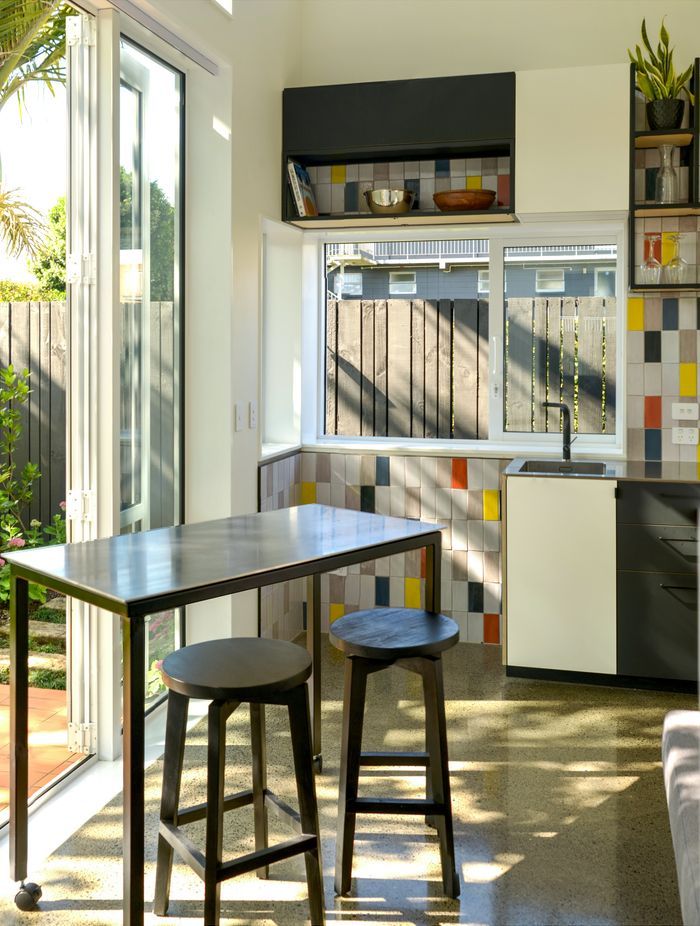 The kitchen, dining, and living space is designed to be multi-purpose.