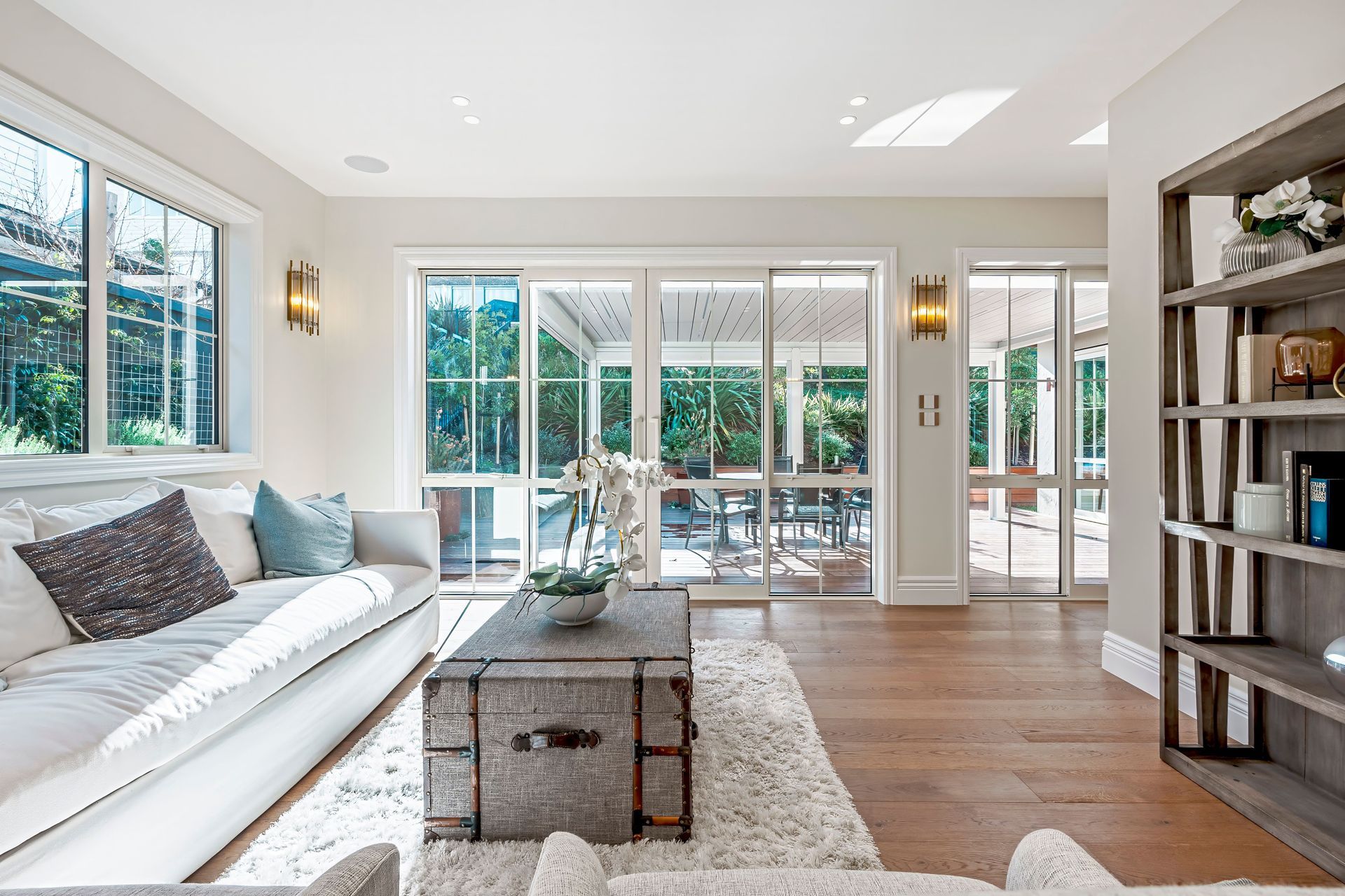 The light-filled living area opens out onto the patio.