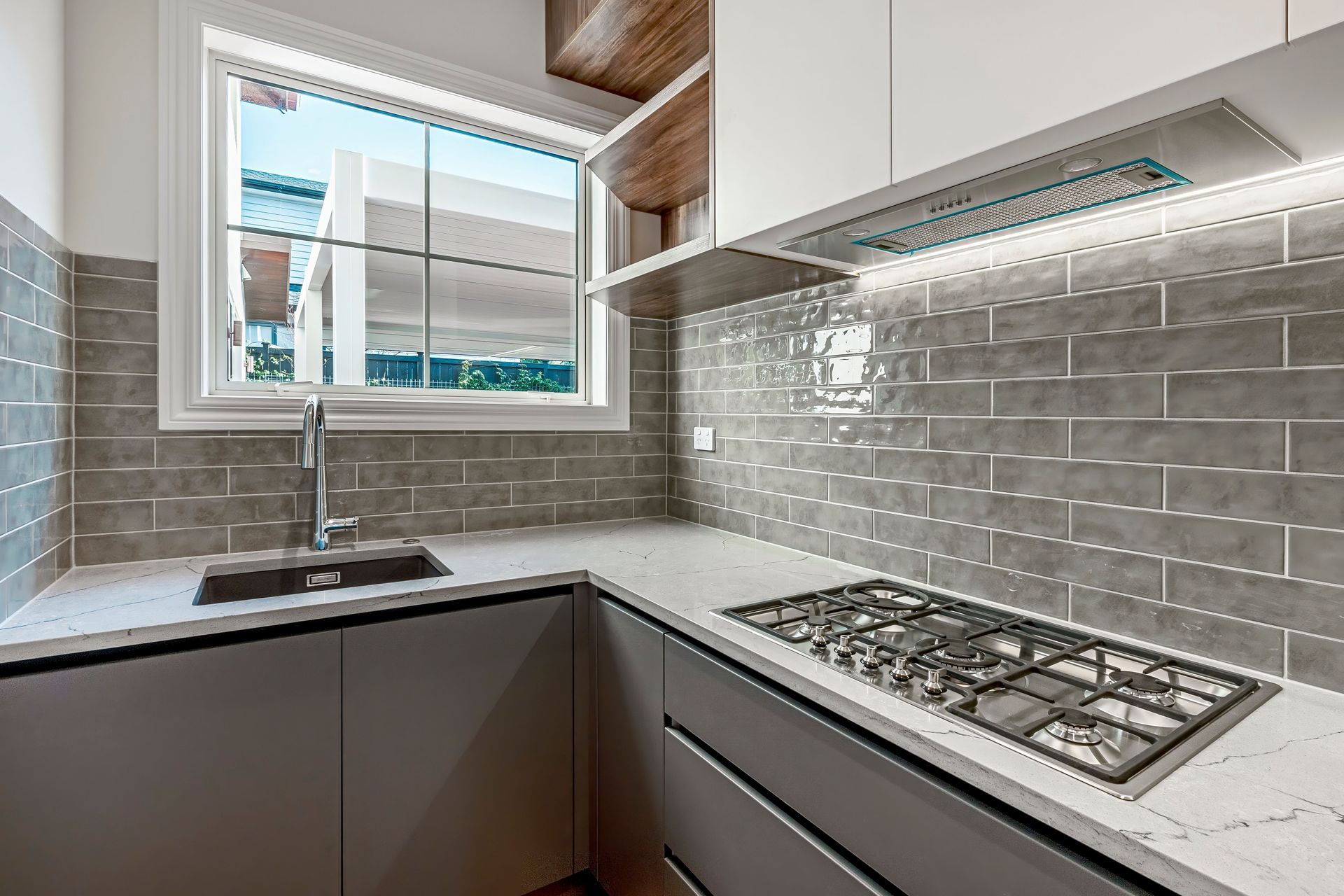 The scullery is shared by the main house and the unit.