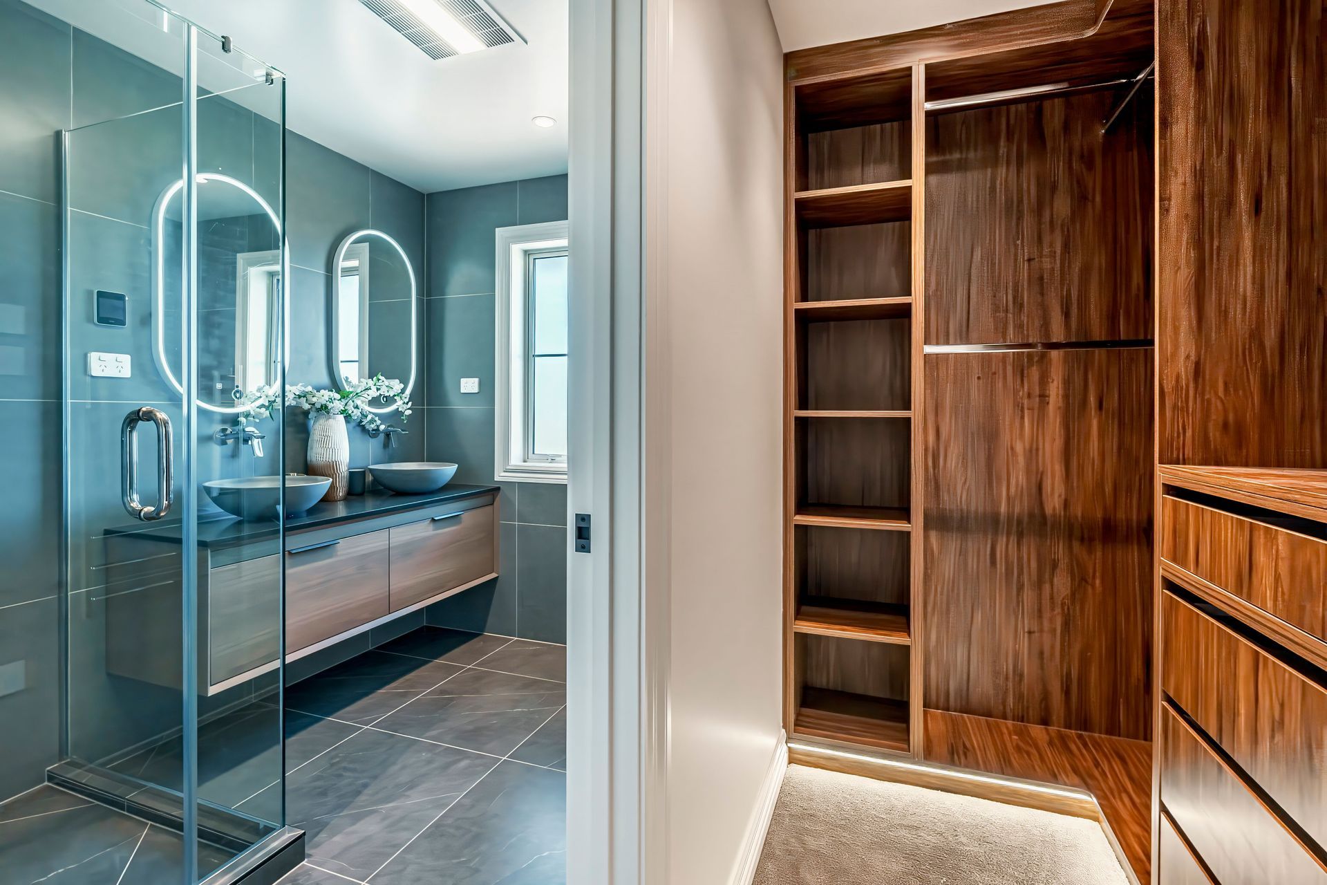 The bathrooms are accessed via walk-through wardrobes.