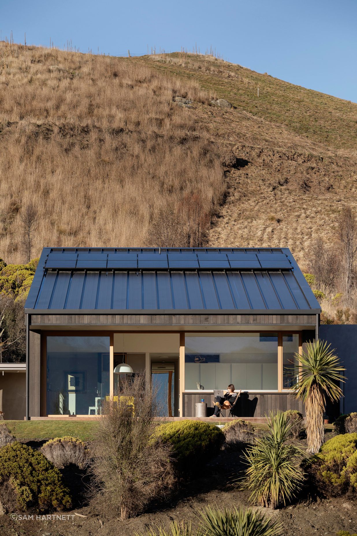 A light-filled living, kitchen, dining area faces north.