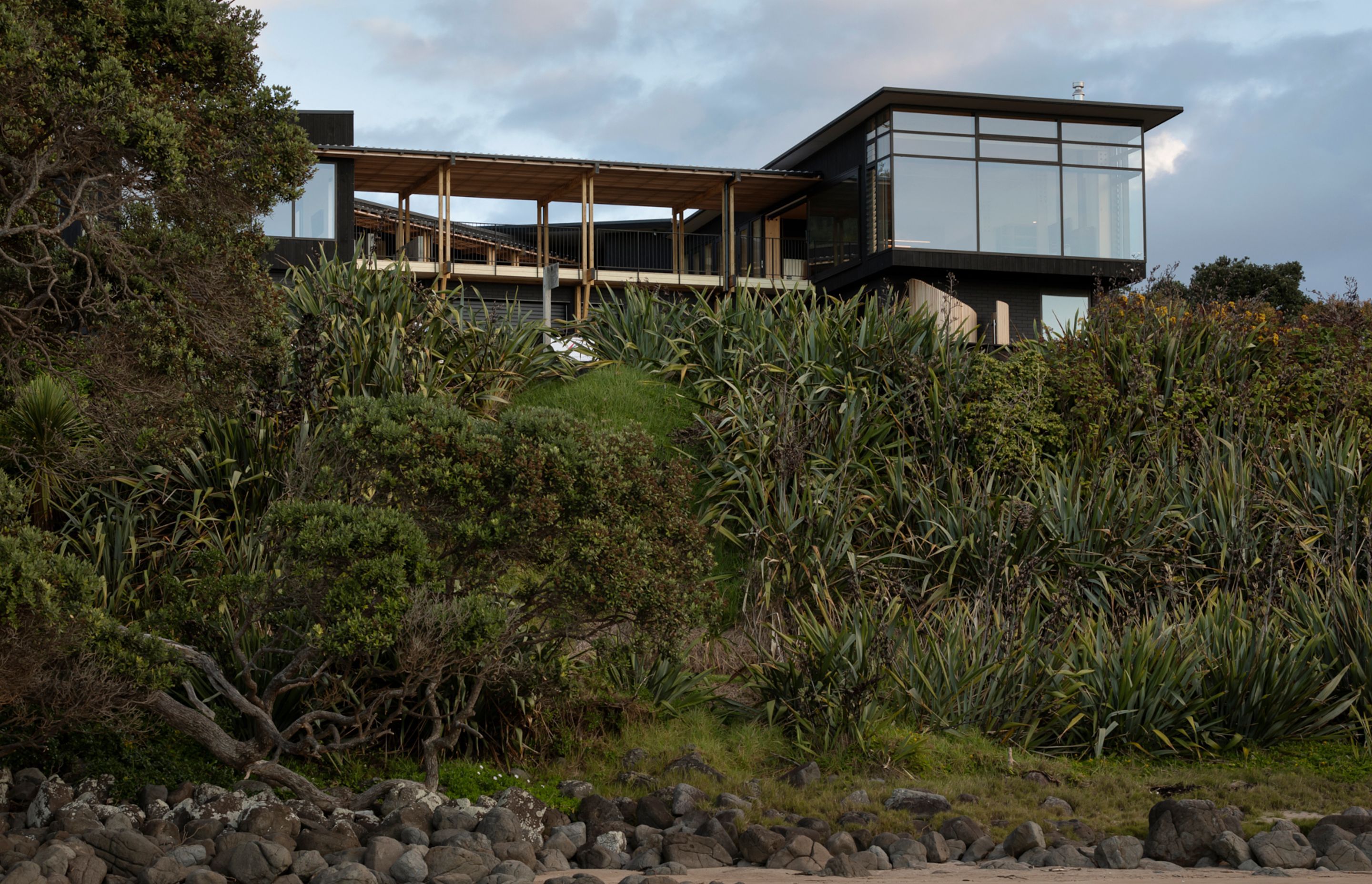 The house has five bedrooms, two bathrooms and two powder rooms. The build was by Hot Water Beach Design and Construction and uses mainly Accoya timber.