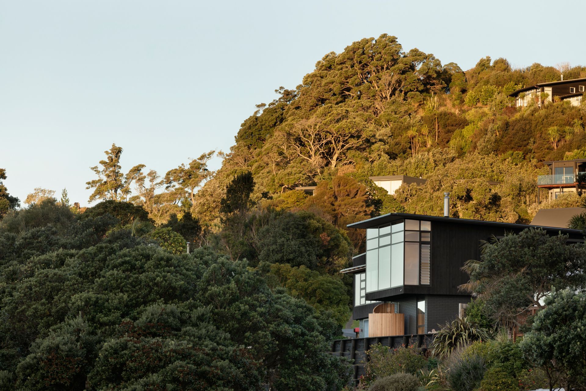 The homeowners don’t use their cars once they arrive from Auckland, so they keep them in a garage at the back of the house while the watercraft are garaged at the front. So much storage is ideal, says Lindley. “That road is packed with cars, certainly in summer, and certainly when the tourist season is in full swing.”