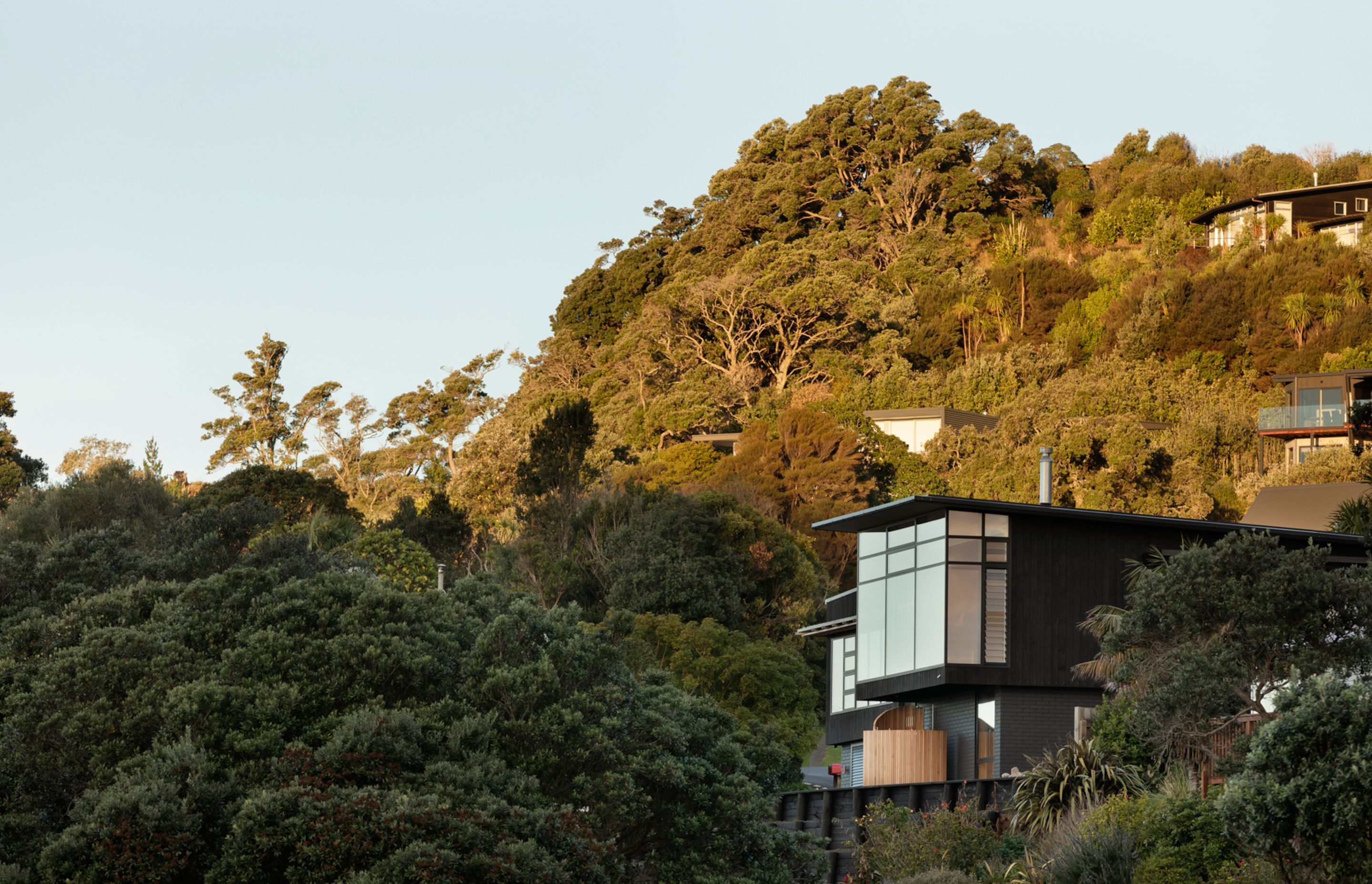 The homeowners don’t use their cars once they arrive from Auckland, so they keep them in a garage at the back of the house while the watercraft are garaged at the front. So much storage is ideal, says Lindley. “That road is packed with cars, certainly in summer, and certainly when the tourist season is in full swing.”