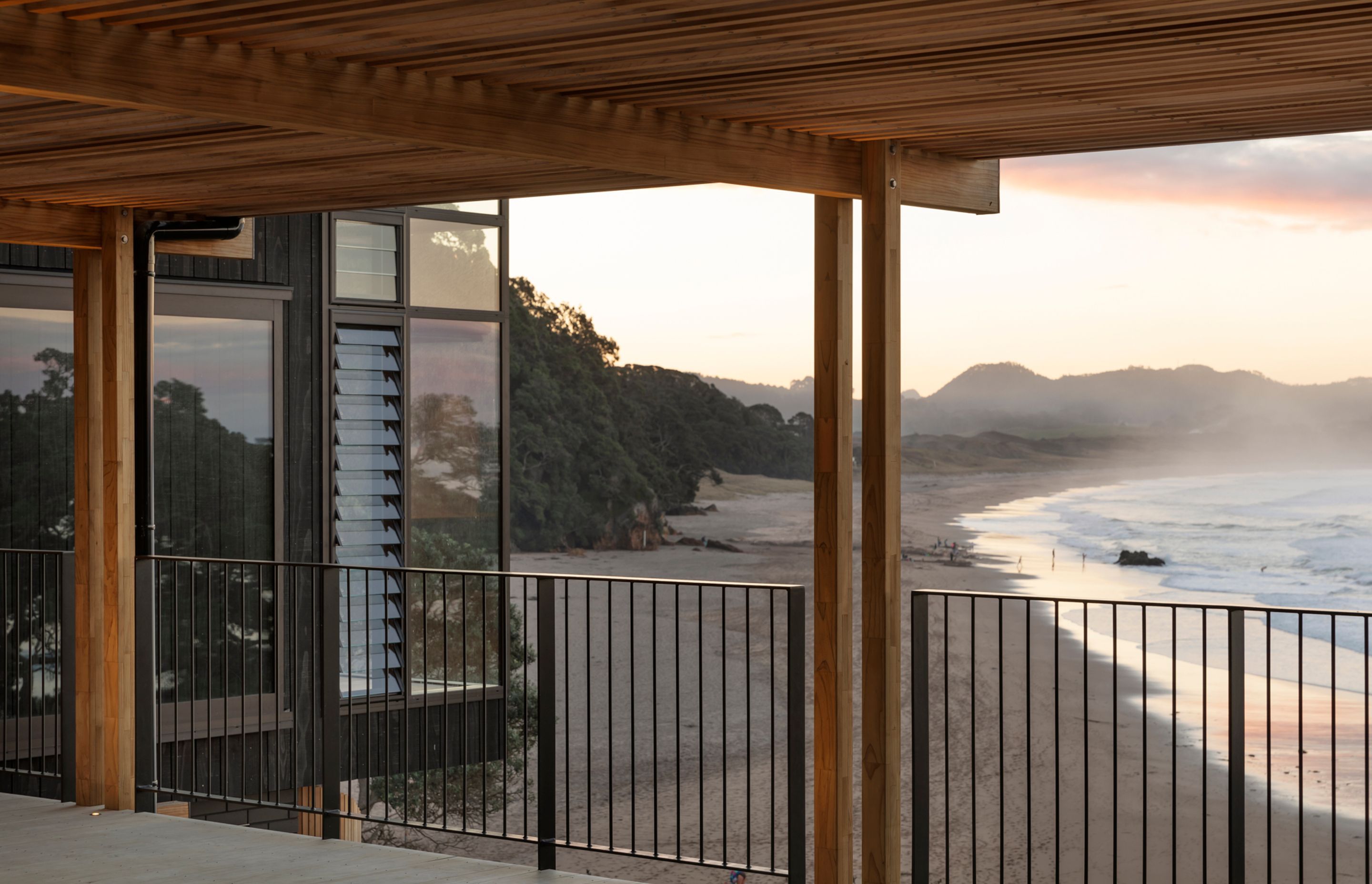 “It’s a fantastic view, looking all the way up Hot Water Beach,” says Lindley. “That's where people go and dig themselves a hole that fills with hot water. It’s a really popular beach, so a lot of the brief was around making a place that was private for the family.”