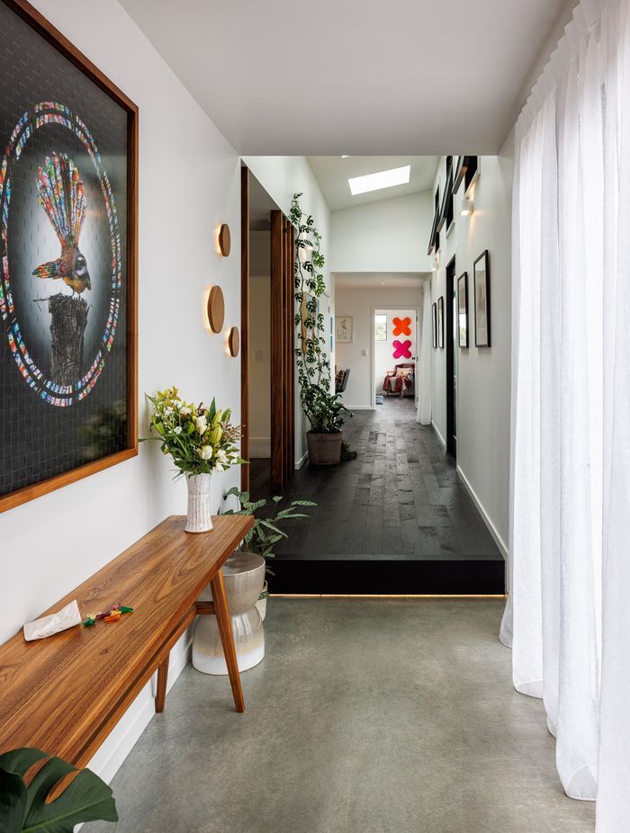 A spacious hallway doubles as a gallery.