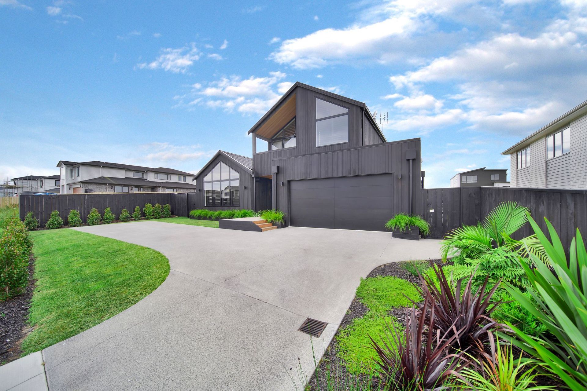 A dark-stained cedar exterior makes for stunning street appeal.