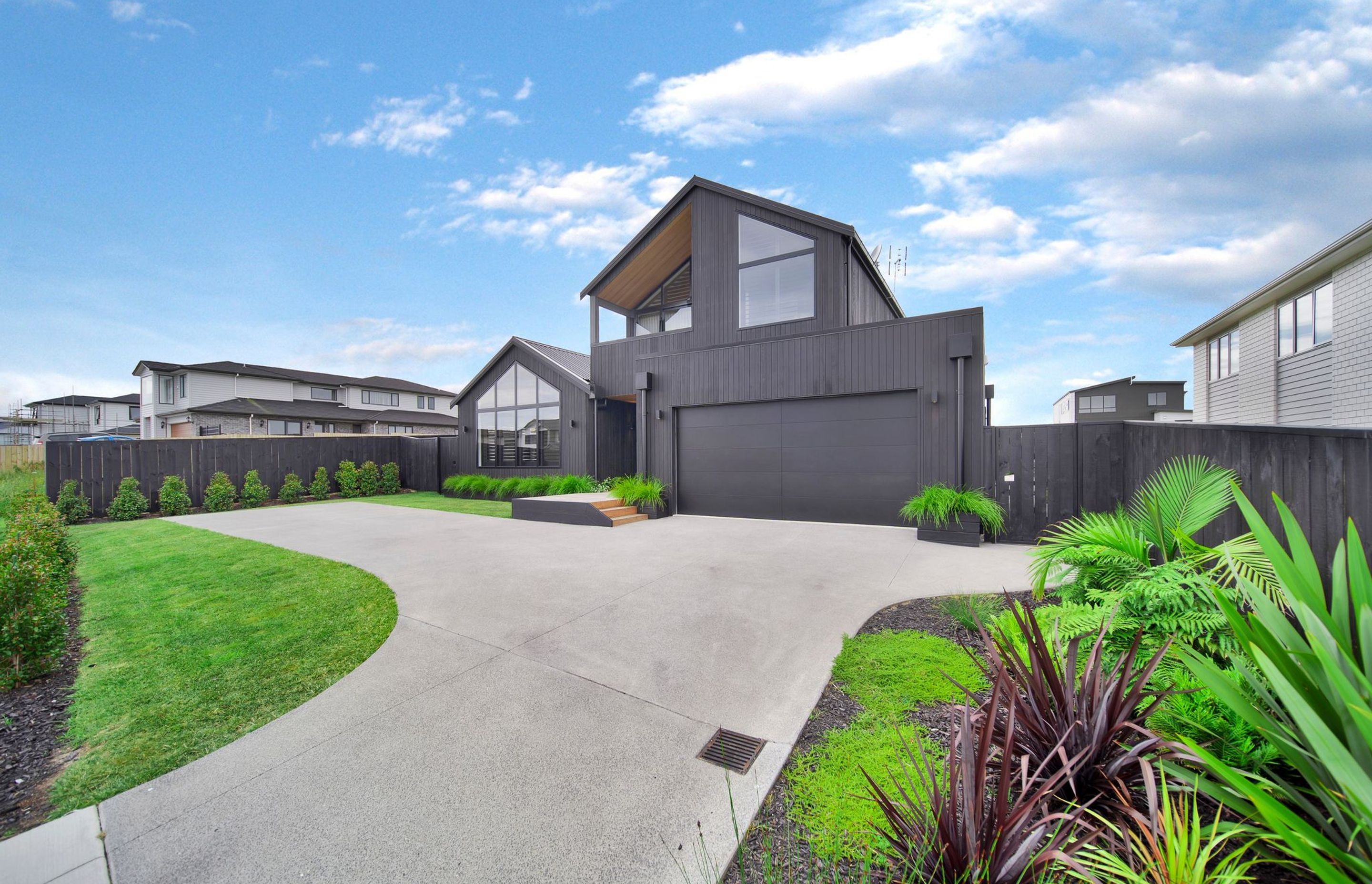 A dark-stained cedar exterior makes for stunning street appeal.