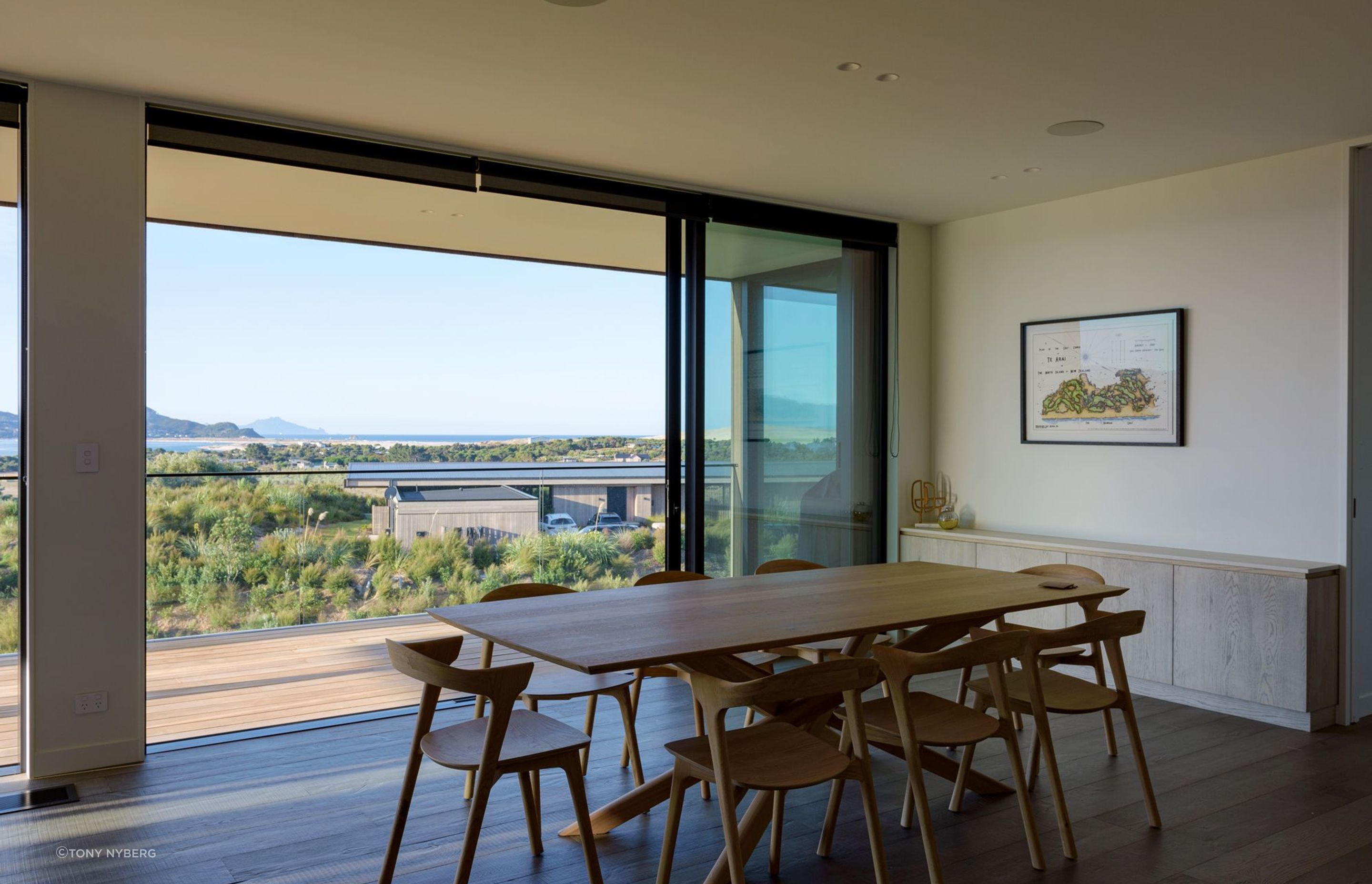 Extensive decking accessed by sliding doors allows the living and dining areas to open up to the outdoors.